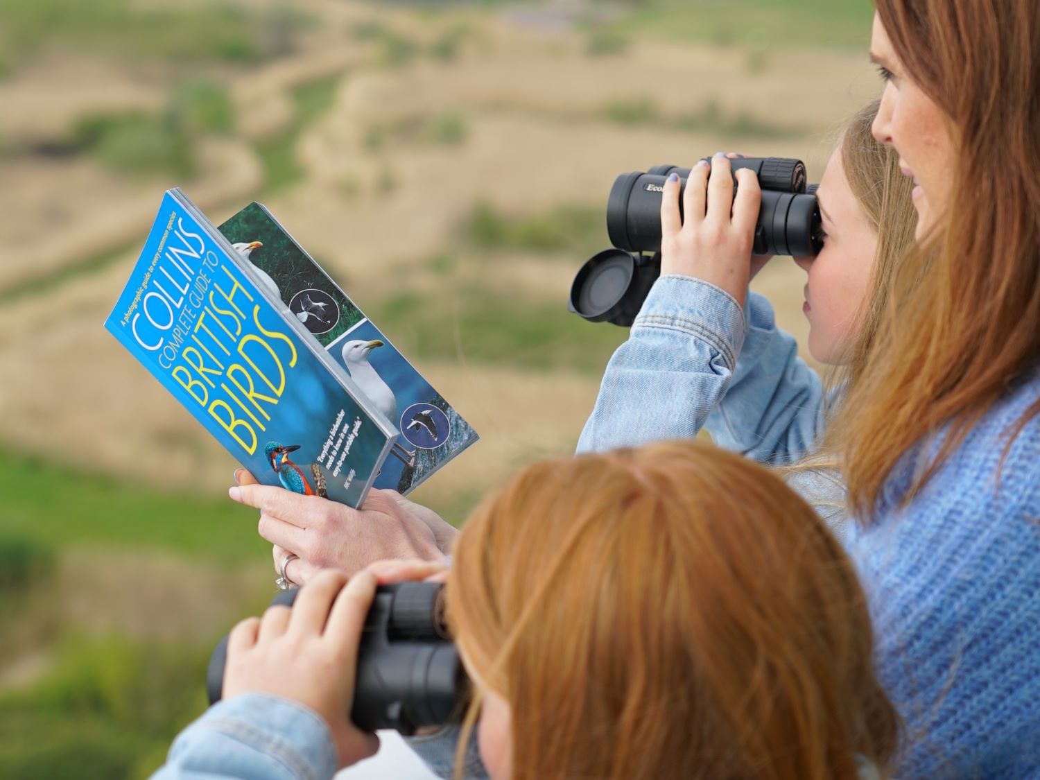 Mom and kids birdwatching