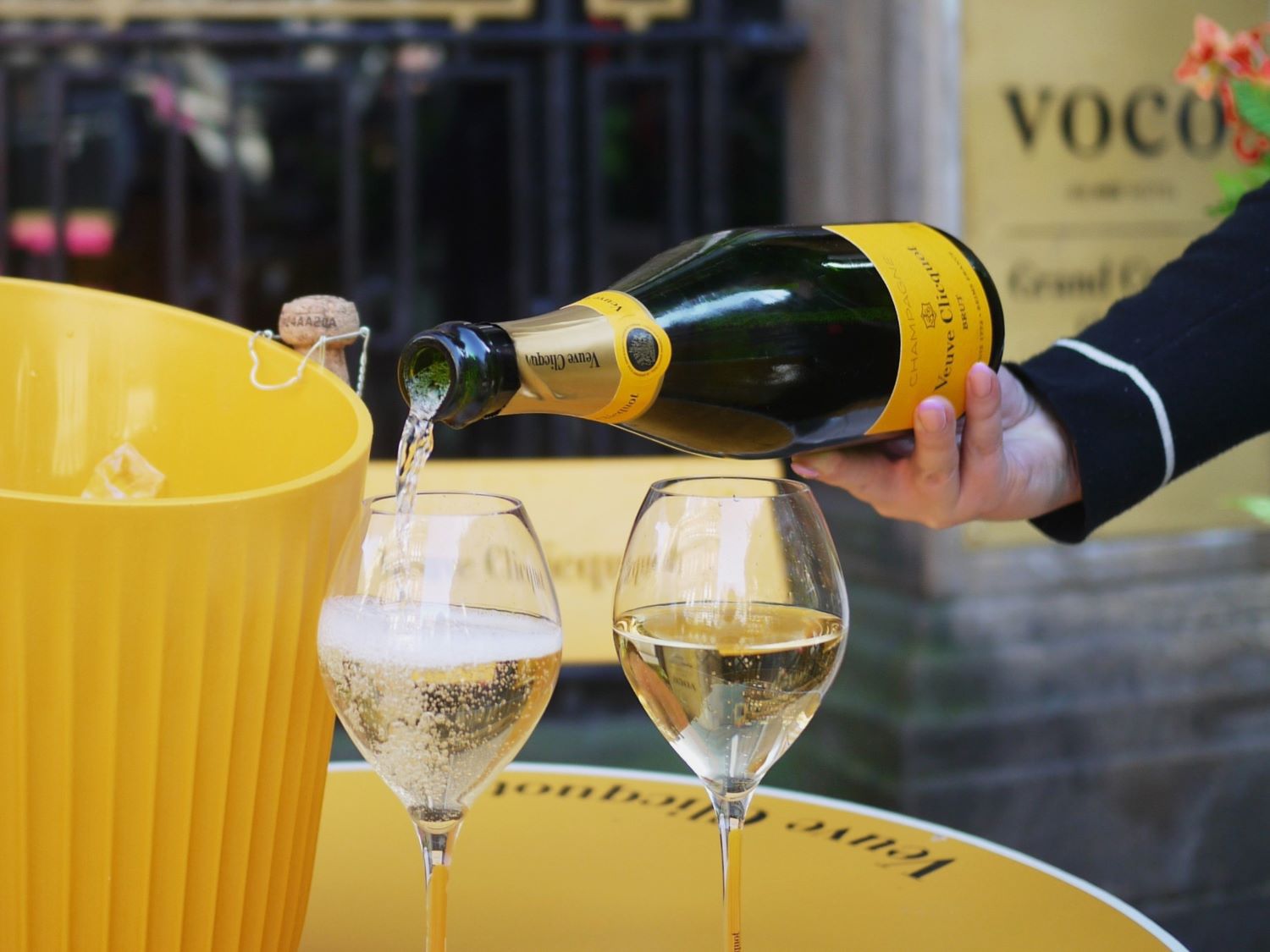 Waiter pouring champagne