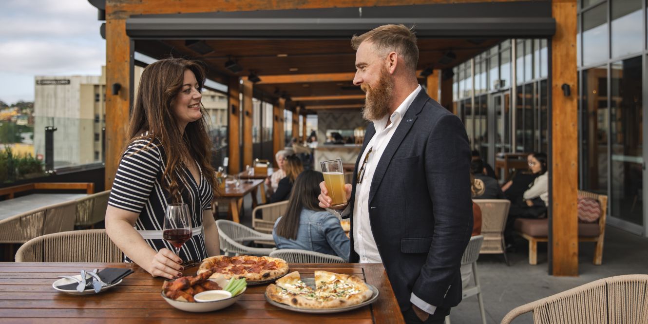 patrons at The Deck at night