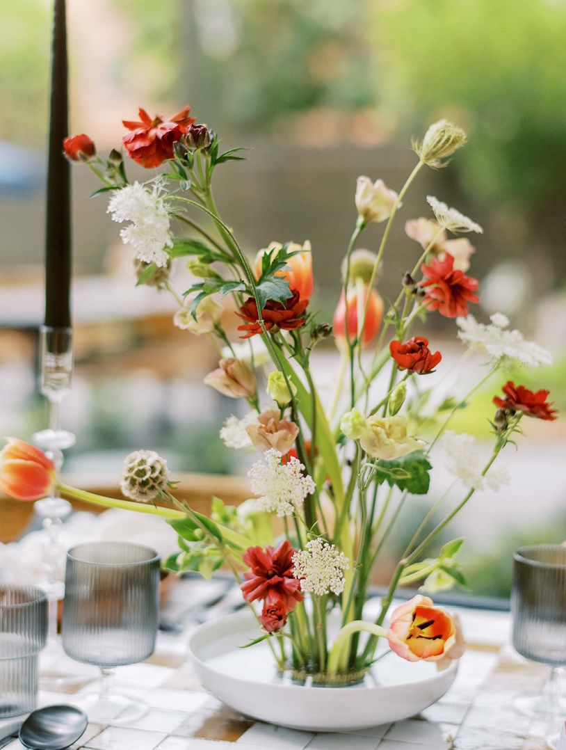 close up of a catering display with deviled eggs and stemless champagne glassware