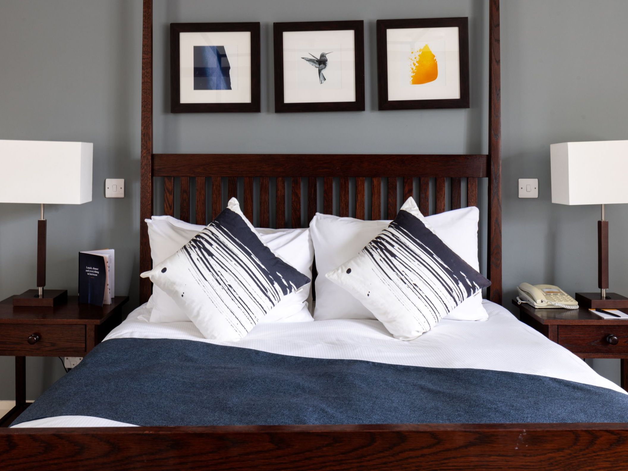 Cozy bed in hotel room