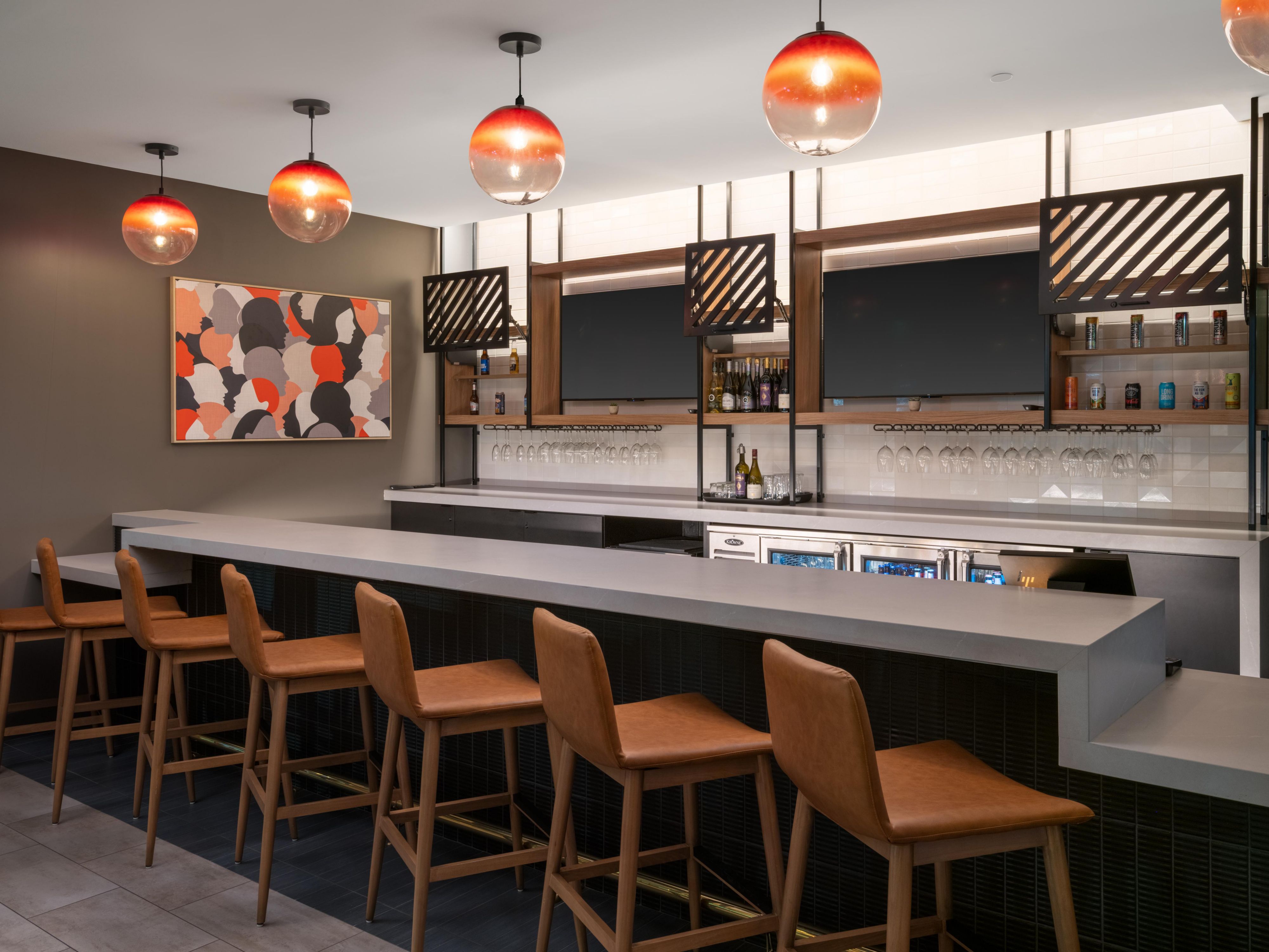 Unwind at our inviting lobby bar or enjoy a sophisticated experience at our wine bar facing Water Street. Whether you're sipping a crafted cocktail, savoring a fine wine, or enjoying our menu of traditional small plates, our spaces are perfect for socializing or relaxing after a day of exploring Henderson’s vibrant neighborhood.