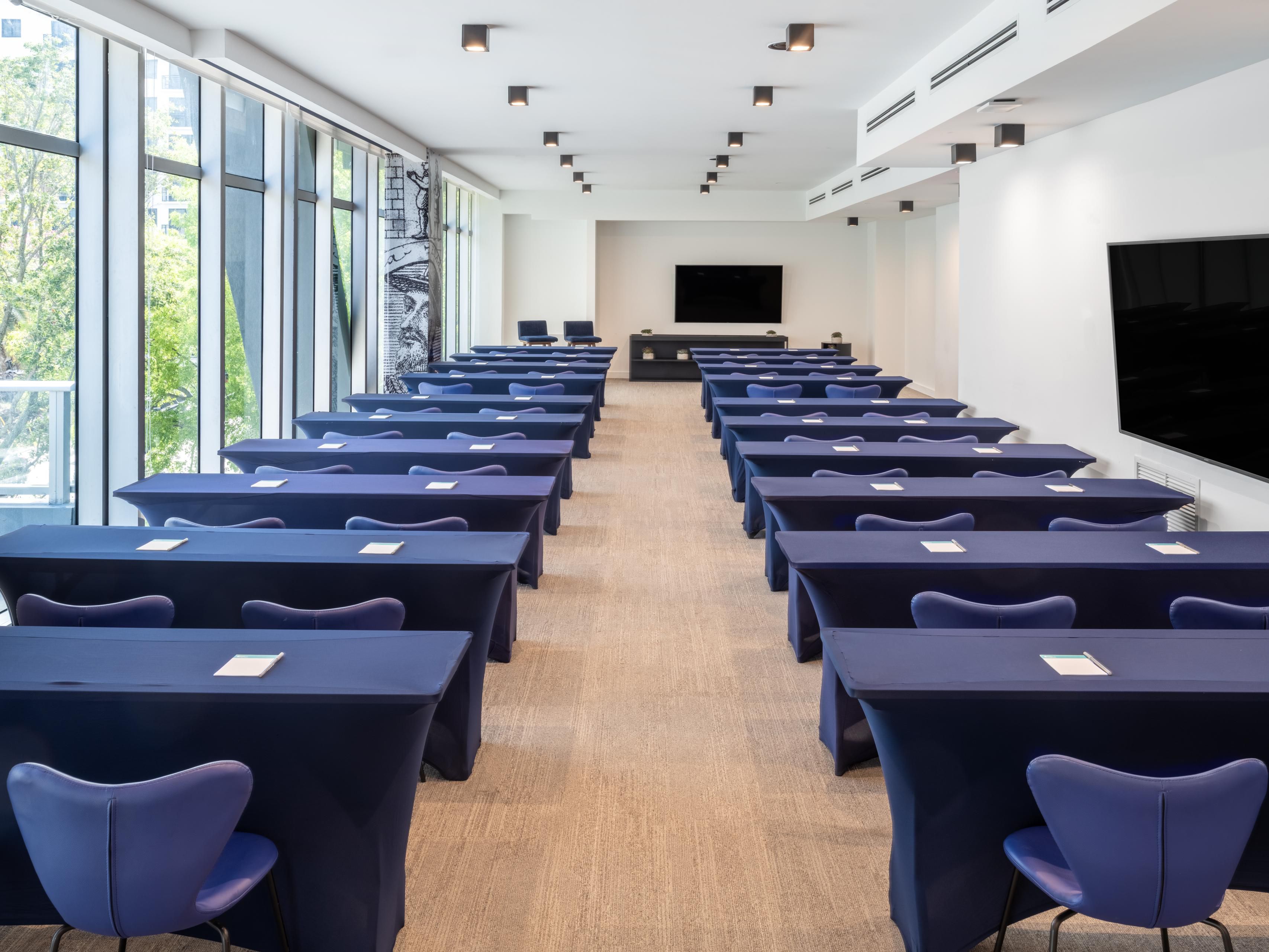 Meeting room with tables for conference