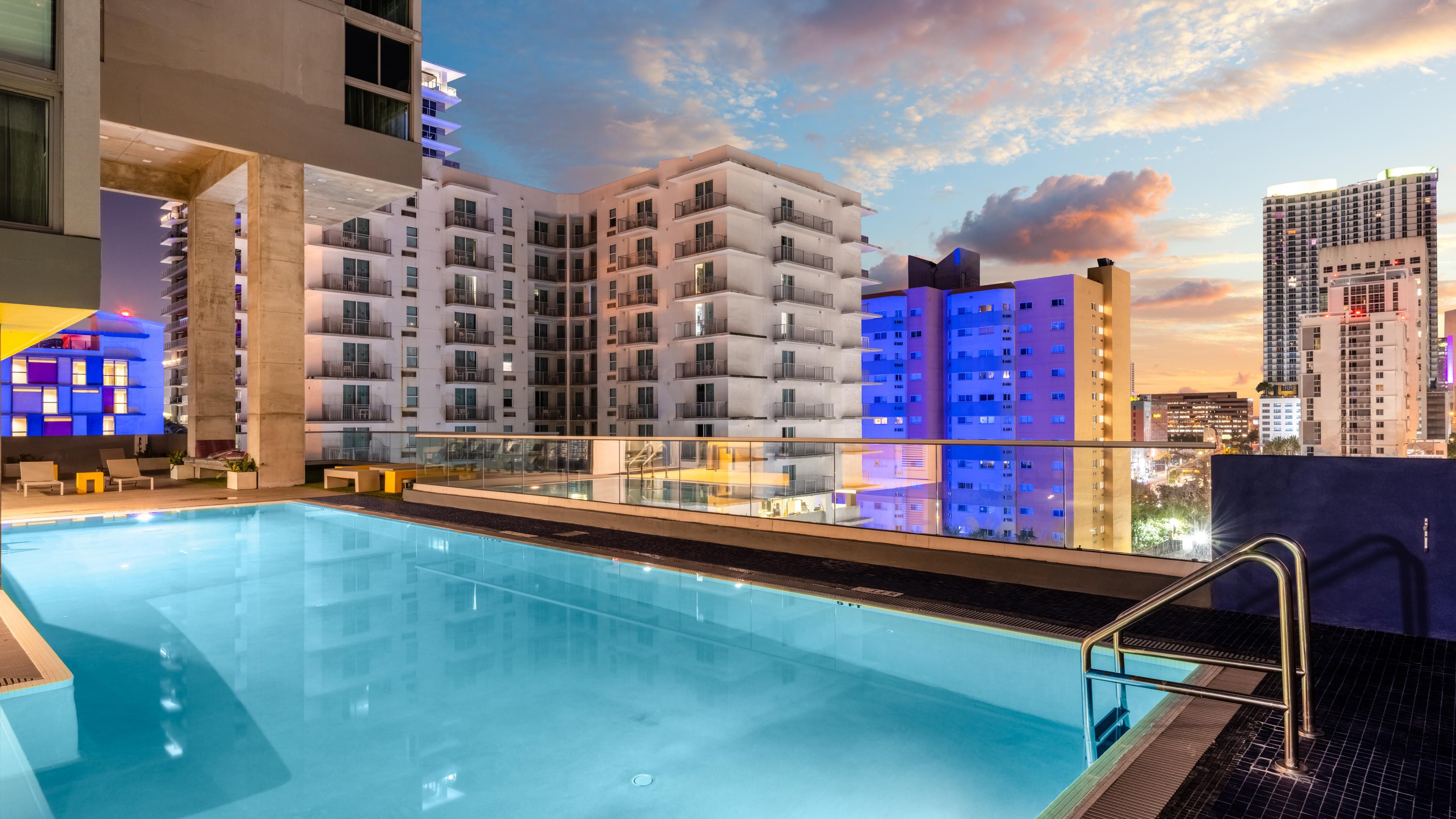 Outdoor heated pool overlooking downtown Miami