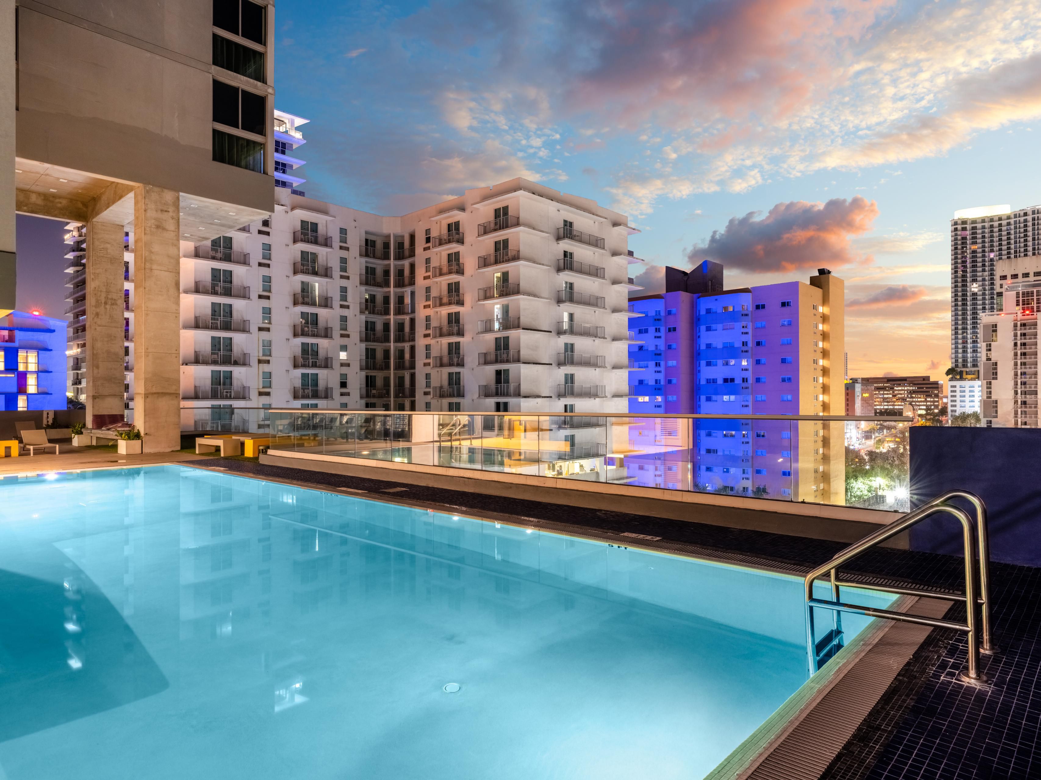 Outdoor heated pool overlooking downtown Miami