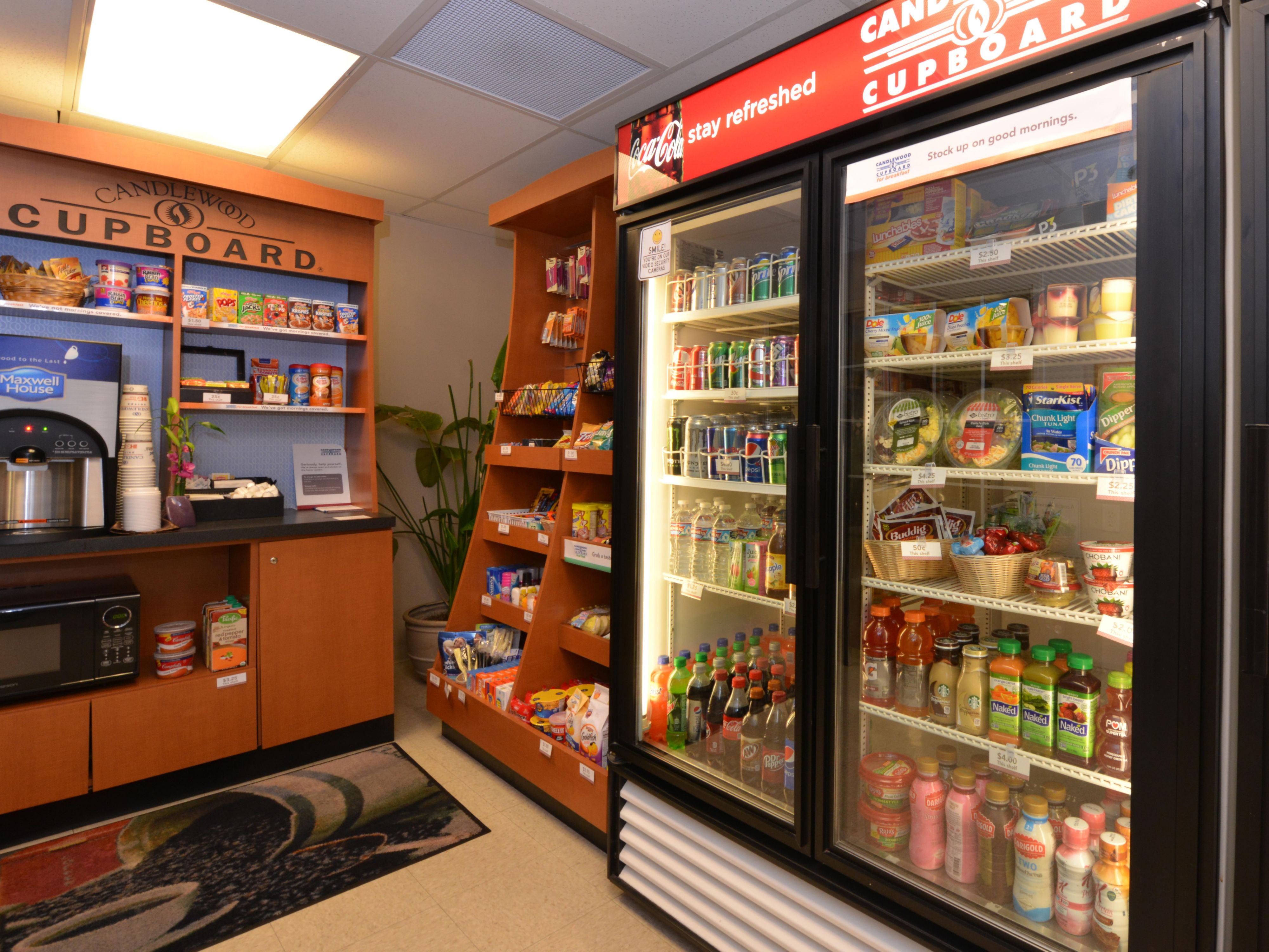 Explore offerings at the Candlewood Cupboard. From forgotten toiletries to late-night cravings, our Cupboard has you covered.  Whether you need a quick snack, breakfast, or a meal, our Cupboard ensures you have everything you need for a seamless and enjoyable stay. Welcome to convenience redefined. 