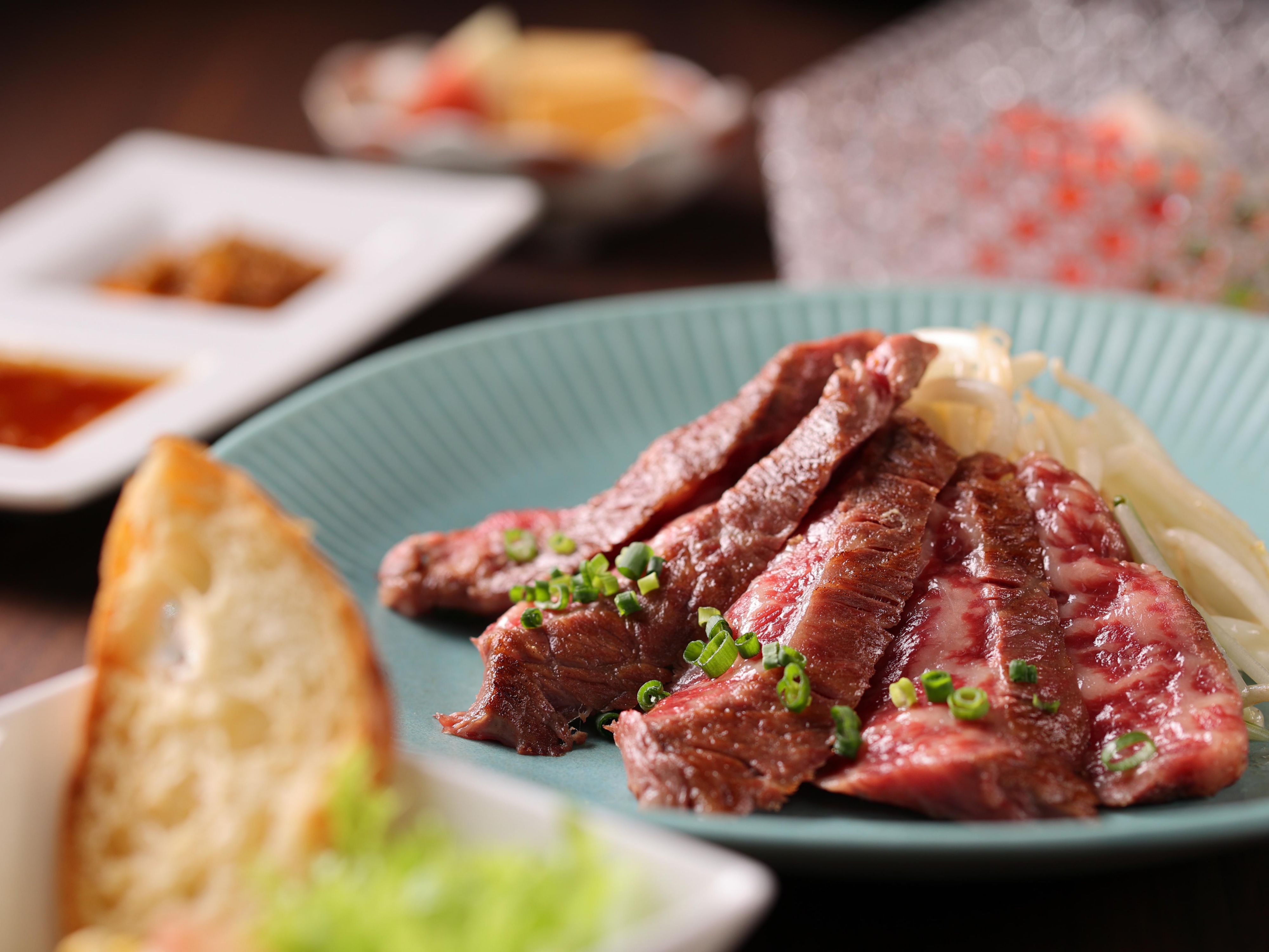 Enjoy a stunning panoramic night view of Narita Airport from the 17th floor at Sky Dining Saifu. Indulge in a wide selection of alcoholic and non-alcoholic beverages, complemented by light snacks and authentic Japanese set menus. Perfect for a memorable dining experience with breathtaking views.