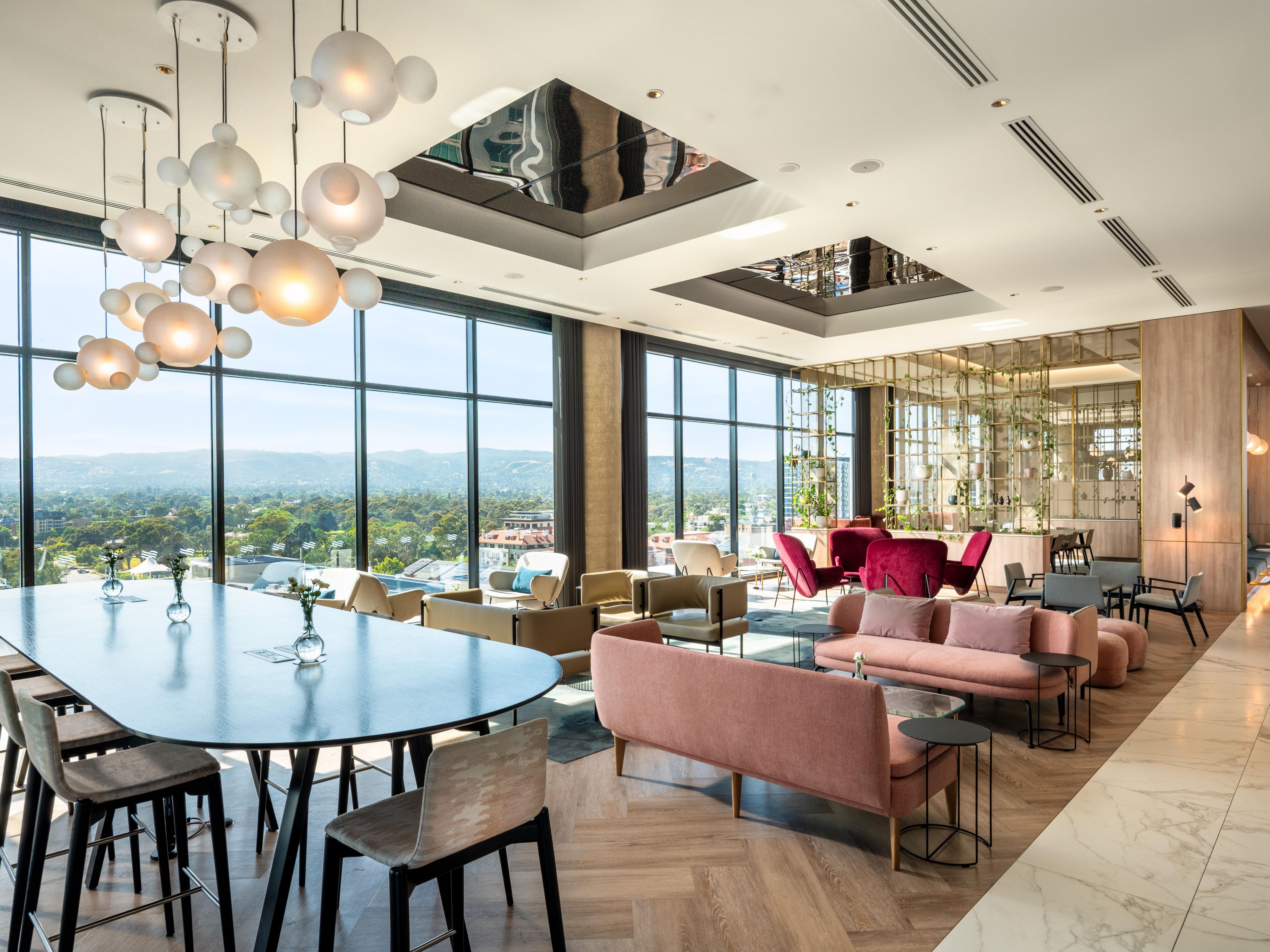 Check in at new heights. Your Adelaide escape begins on Level 10, where endless views and a warm welcome await. Swim under open skies, recharge in the gym, sip cocktails at Luna10, stay inspired at the Plaza Workspace, and complete your journey with bold flavours at KOOMO.