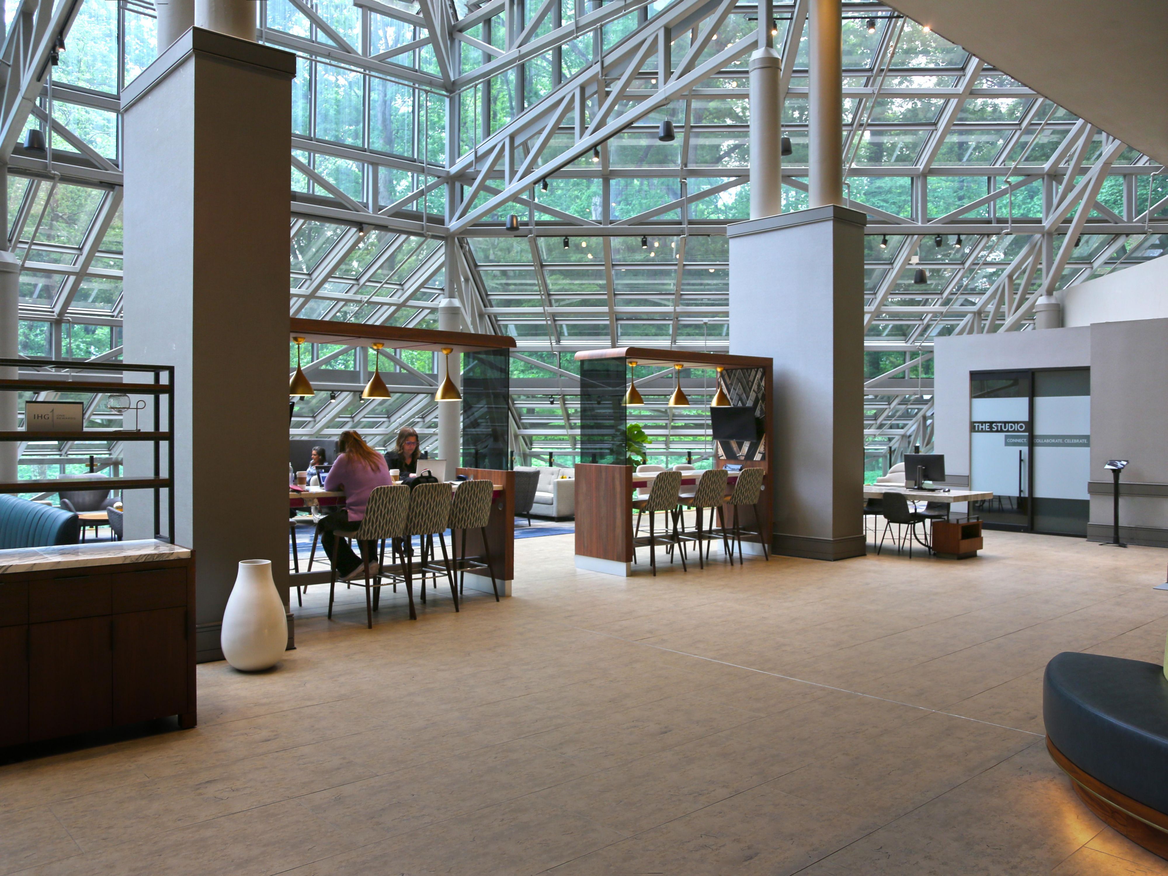 Re-define your modern-day workplace in our Plaza Workspace. This adaptive, light-filled environment is perfect for working solo or collaborating with your team. Hide in a nook, huddle around a community table, or reserve a studio. Our workspace offers free Wi-Fi, power outlets, and digital tablets for ordering food and drinks.