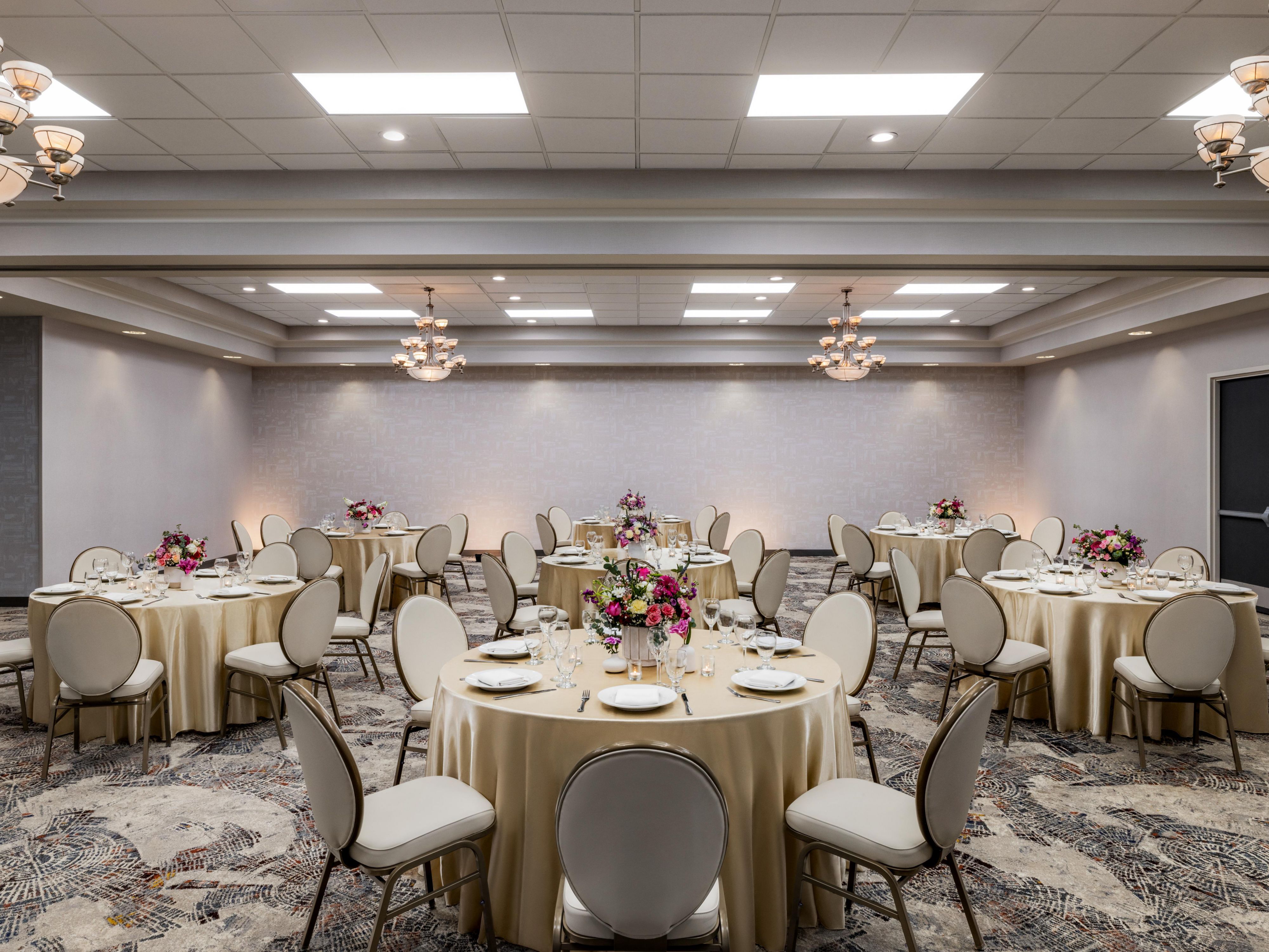 Modern venues, seamless service, and details that make a difference. From an elegant ballroom to a bridal suite designed for getting ready in comfort. With perks like mirrors, outlets, and mimosa service, we create a wedding experience that feels effortless and entirely yours.