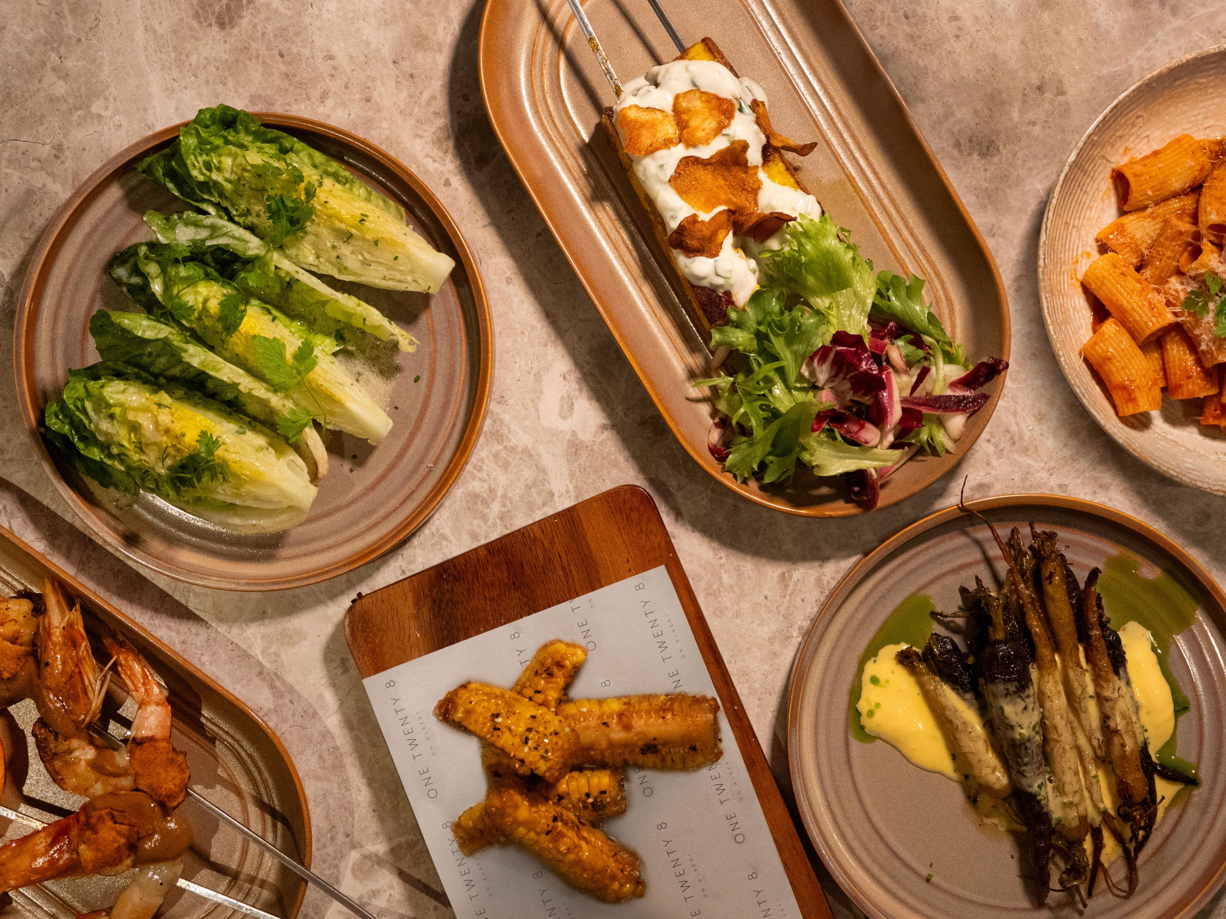 At One Twenty 8, relaxed charm meets refined dining. Guided by fire, smoke, and the best local ingredients, our menu celebrates the flavours of land and sea with a modern, elevated touch. Located beside the Lobby, it’s the perfect setting to gather, indulge, and savour every moment.