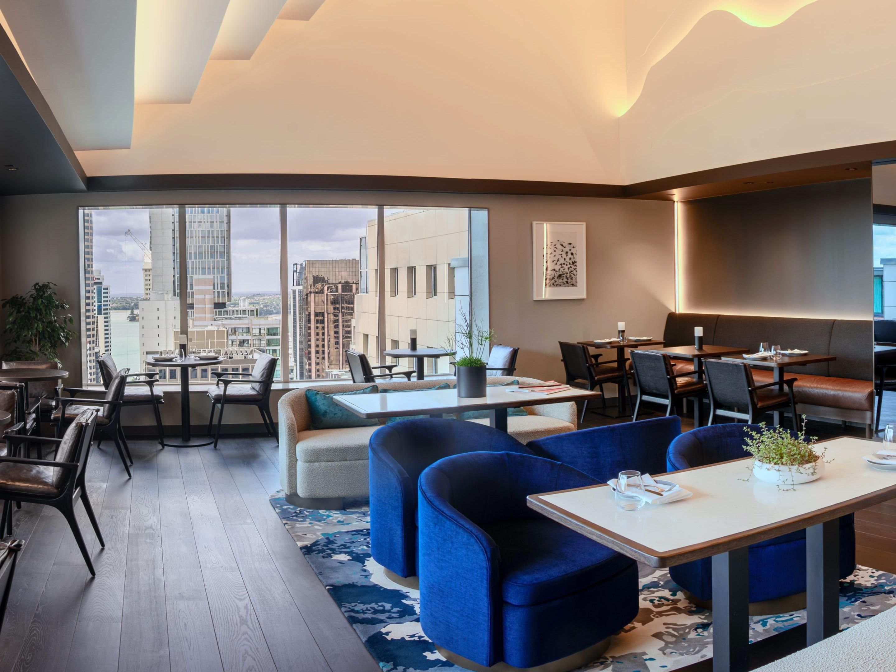 Meticulously designed, the Executive Lounge represents a blend of contemporary elegance and urban luxury. 
Whether you seek a respite from the bustling world or a sophisticated setting to savour a glass of wine, we invite you to experience the Executive Lounge; where the views are endless, the ambiance is inviting, and relaxation thrives. 