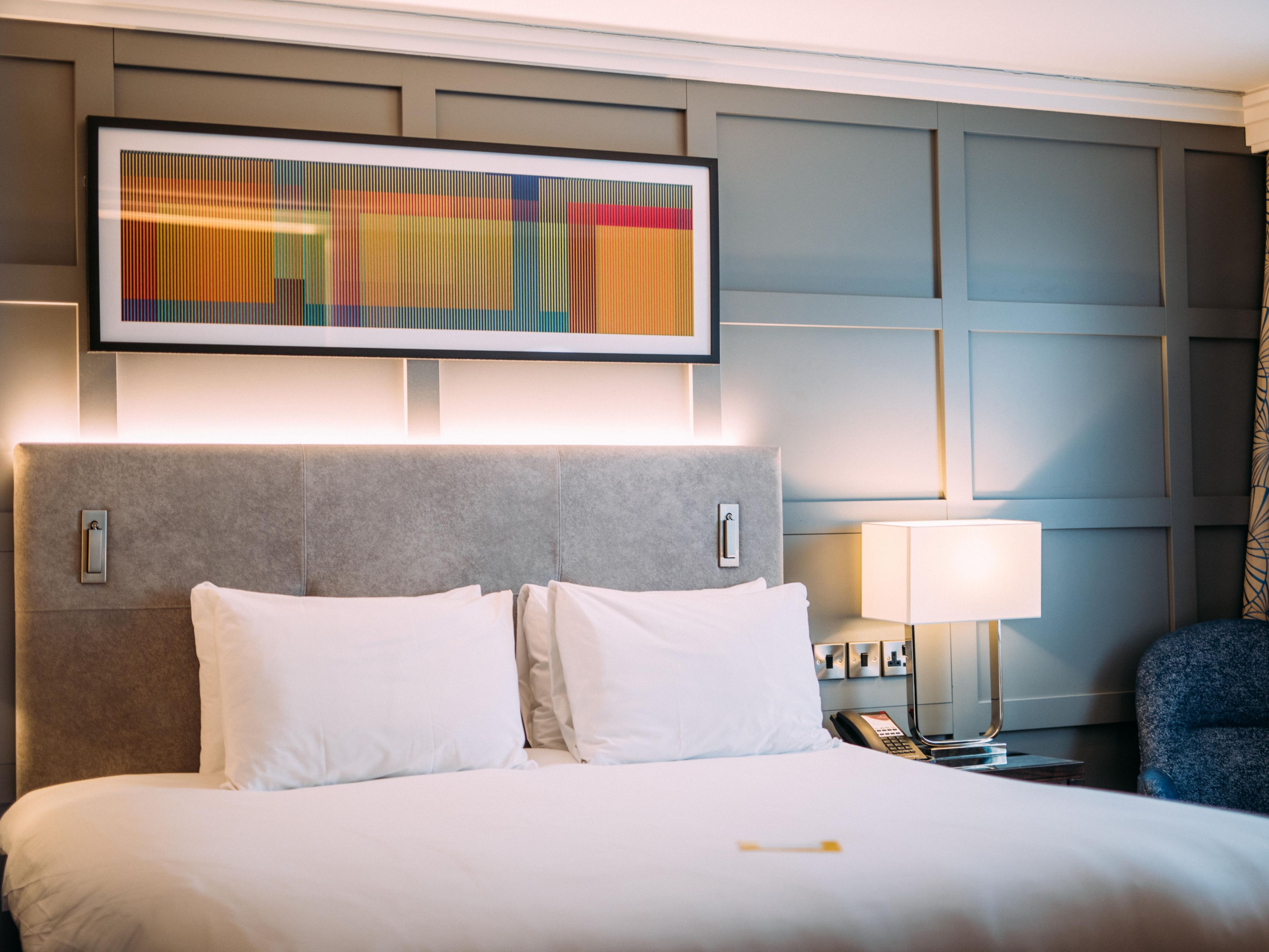 We offer a selection of double rooms with king-size beds and twin rooms, in addition to four luxurious double suites. 
Enjoy our range of in-room amenities including flat screen TV, mini fridge, safe, ironing board and room service menu. Plus with our comfortable beds, premium bedding, you’ll be sure to have a great nights sleep.