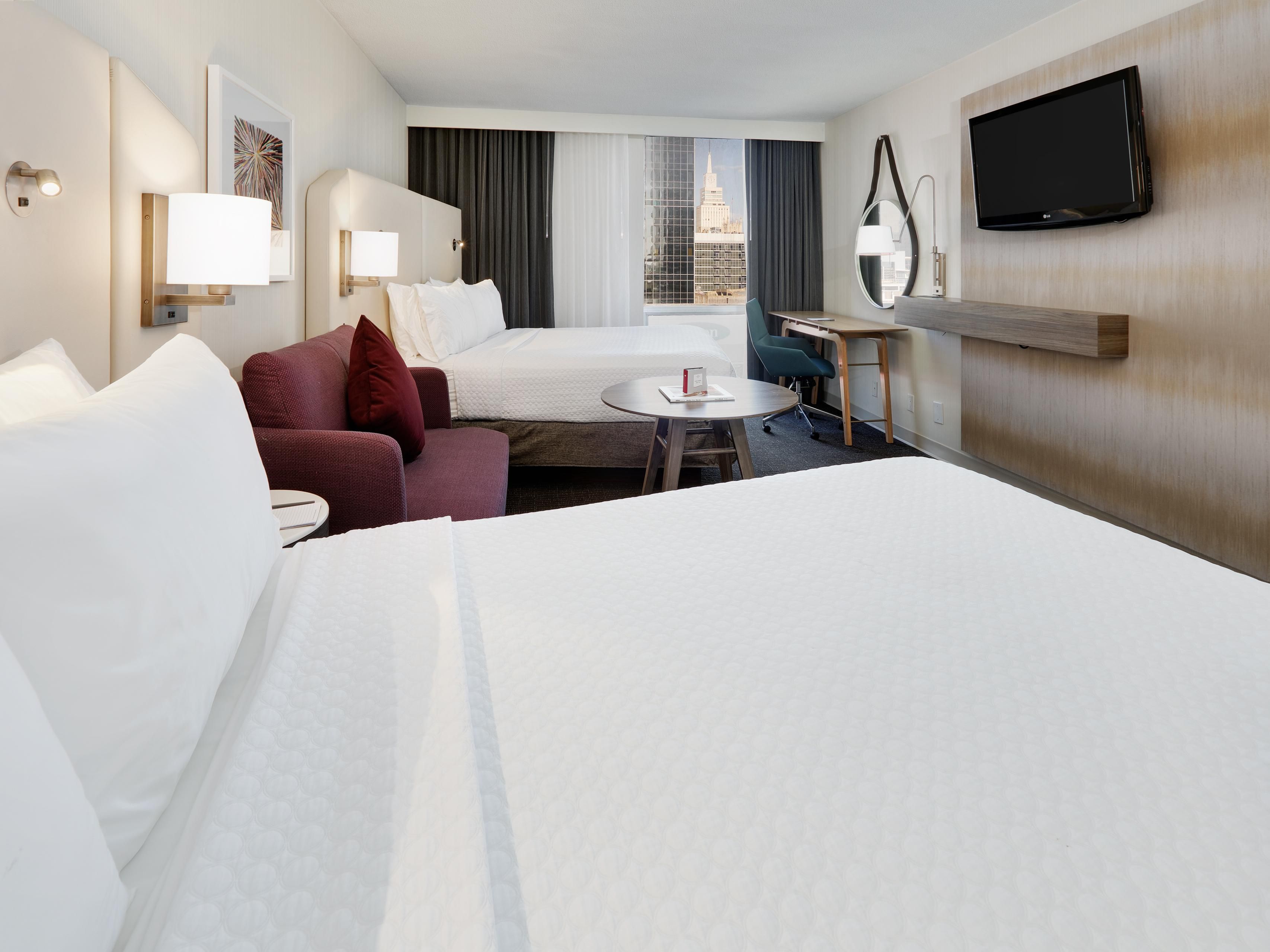 Gaze out over downtown Dallas from two plush queen beds.