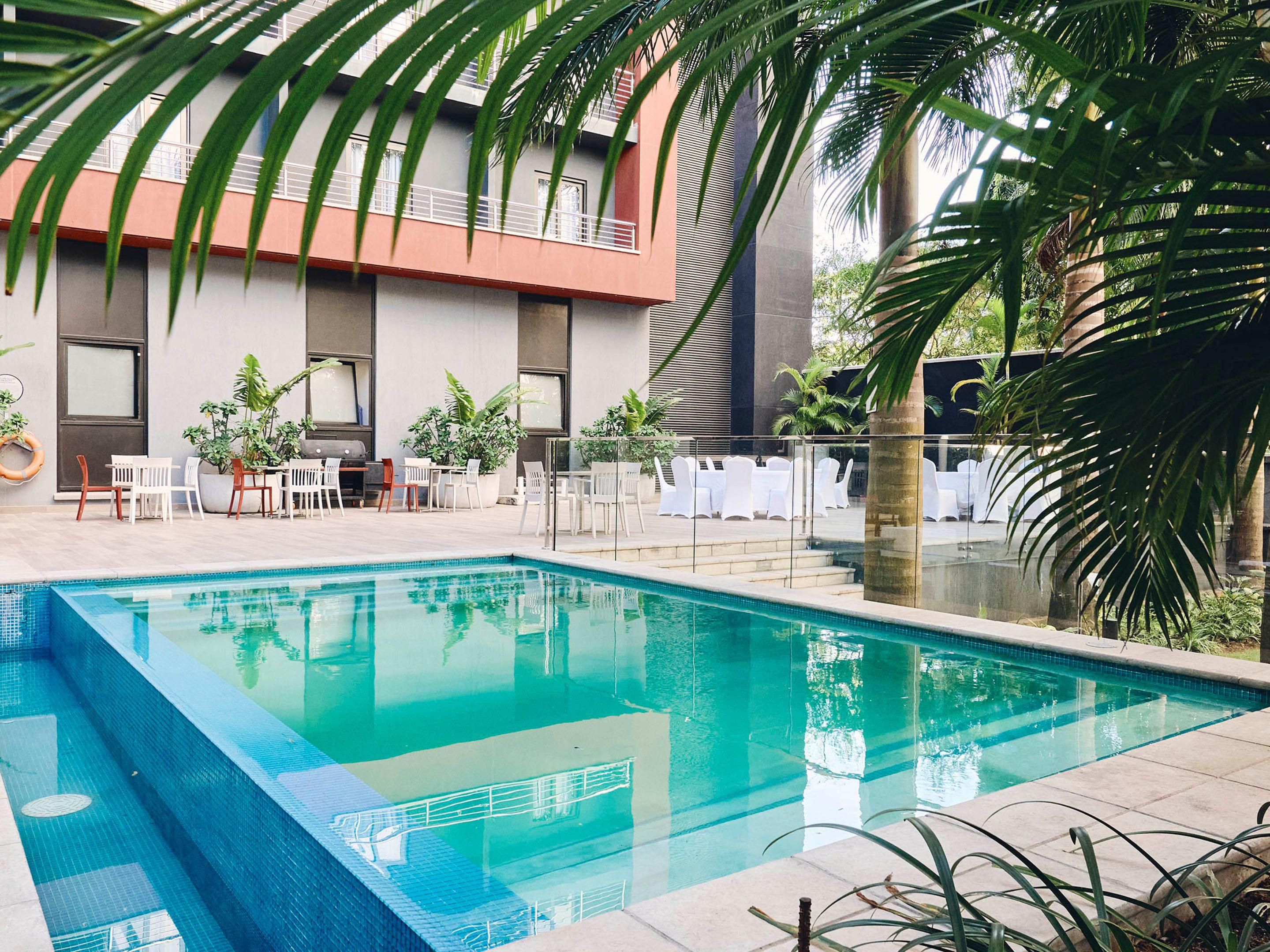 The outdoor pool at Crowne Plaza Dar es Salaam is a serene oasis, offering guests the perfect spot to relax and unwind. Surrounded by lush greenery, the pool provides a tranquil escape from the hustle and bustle of the city. Whether you're enjoying a refreshing swim or lounging by the water, the stunning natural setting enhances atmosphere.