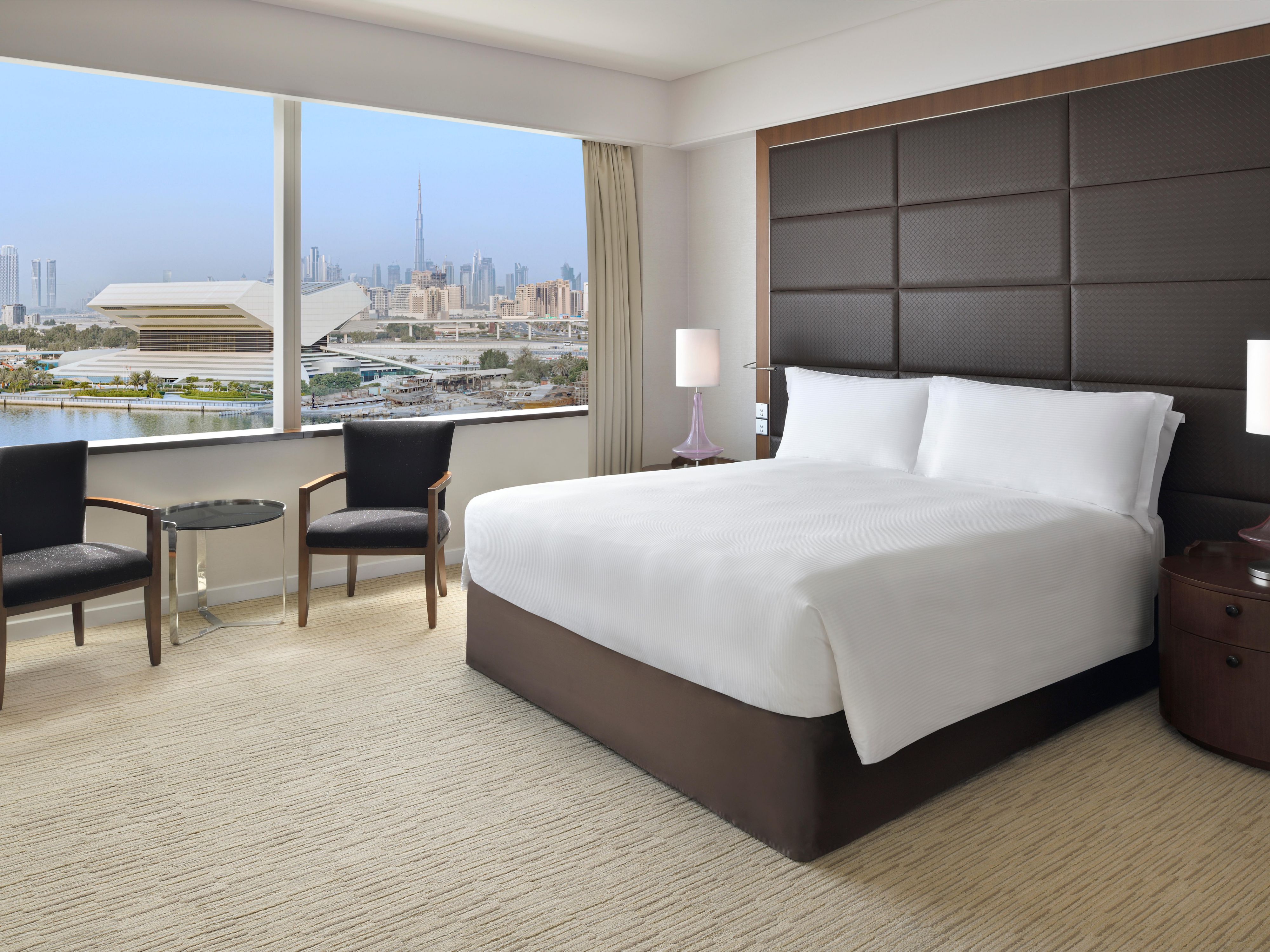 Spacious king bedroom overlooking Dubai waterfront & city skyline