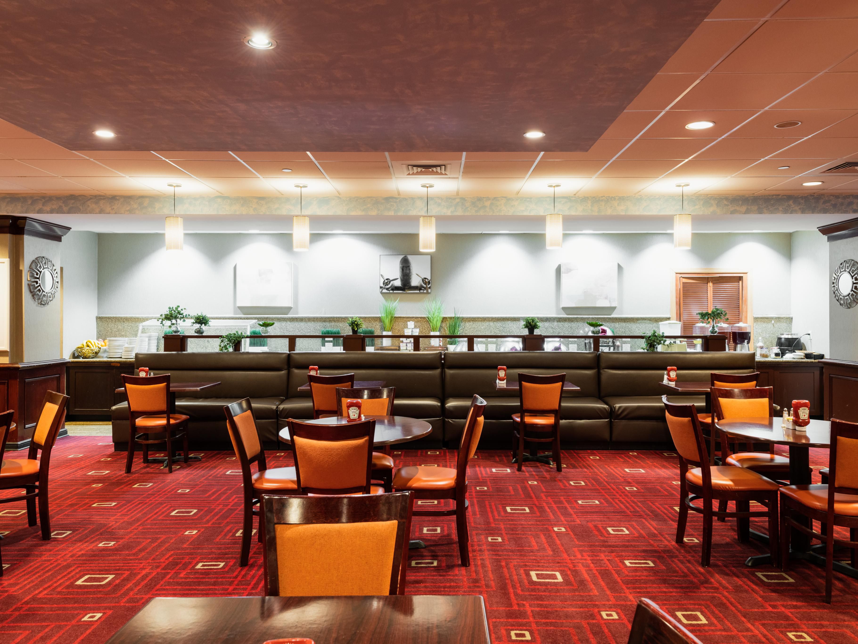 Our hotel lobby restaurant and bar, TKP Lounge and Grill, offers delectable dining with a casual, friendly atmosphere, perfect for a business dinner with friends. Sip on craft beer, wine, or an enticing libation from our full bar.  