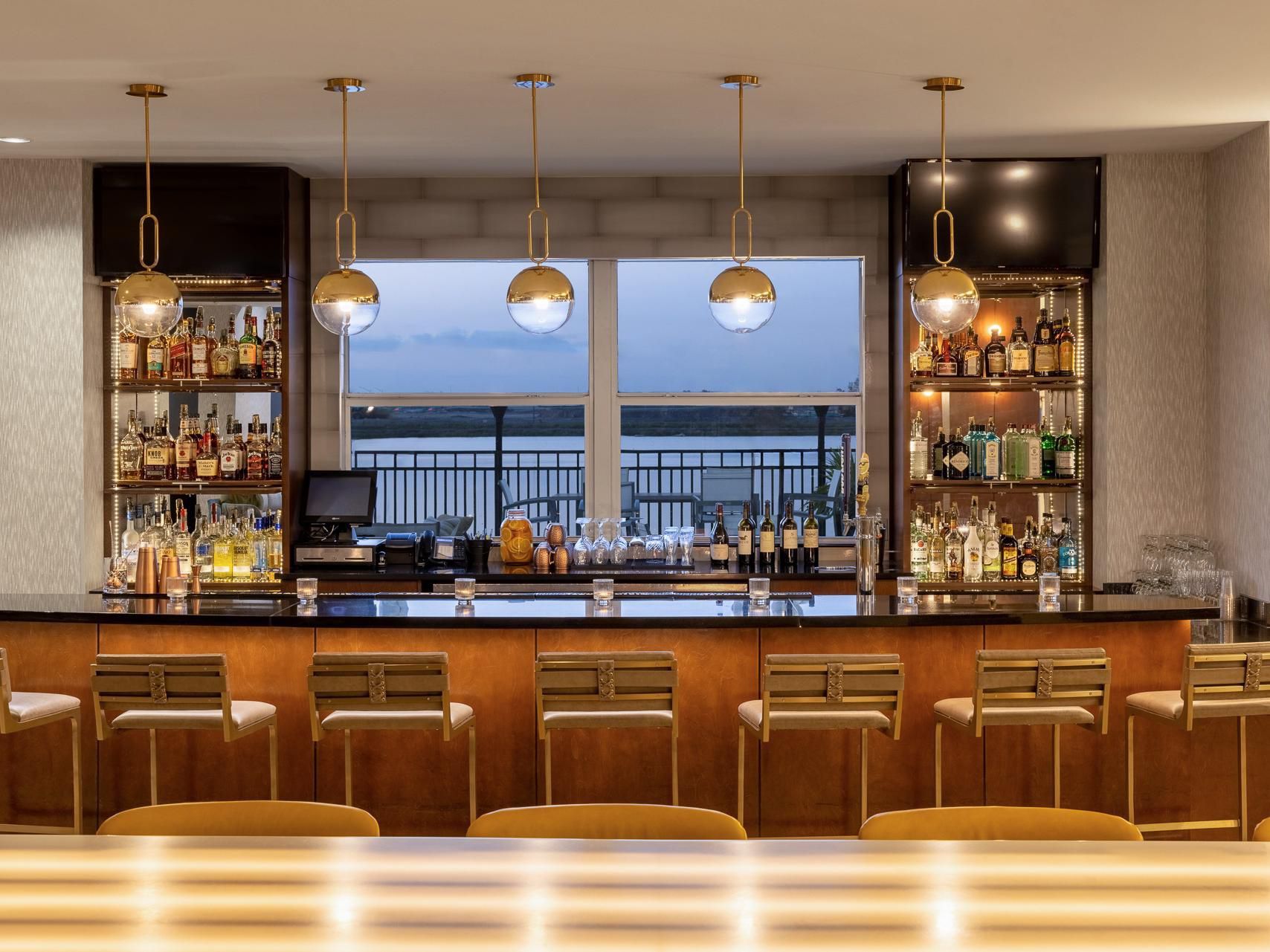 Savor classic cuisine with a regional flair at our onsite indoor and outdoor restaurant, Oasis Restaurant & Bar. Enjoy all-day dining and pair your meals with our eclectic wine list, craft beer, and curated cocktails. From themed food nights to specialized action stations and live music, enjoy our lakeside patio with a fire pit and beautiful views.