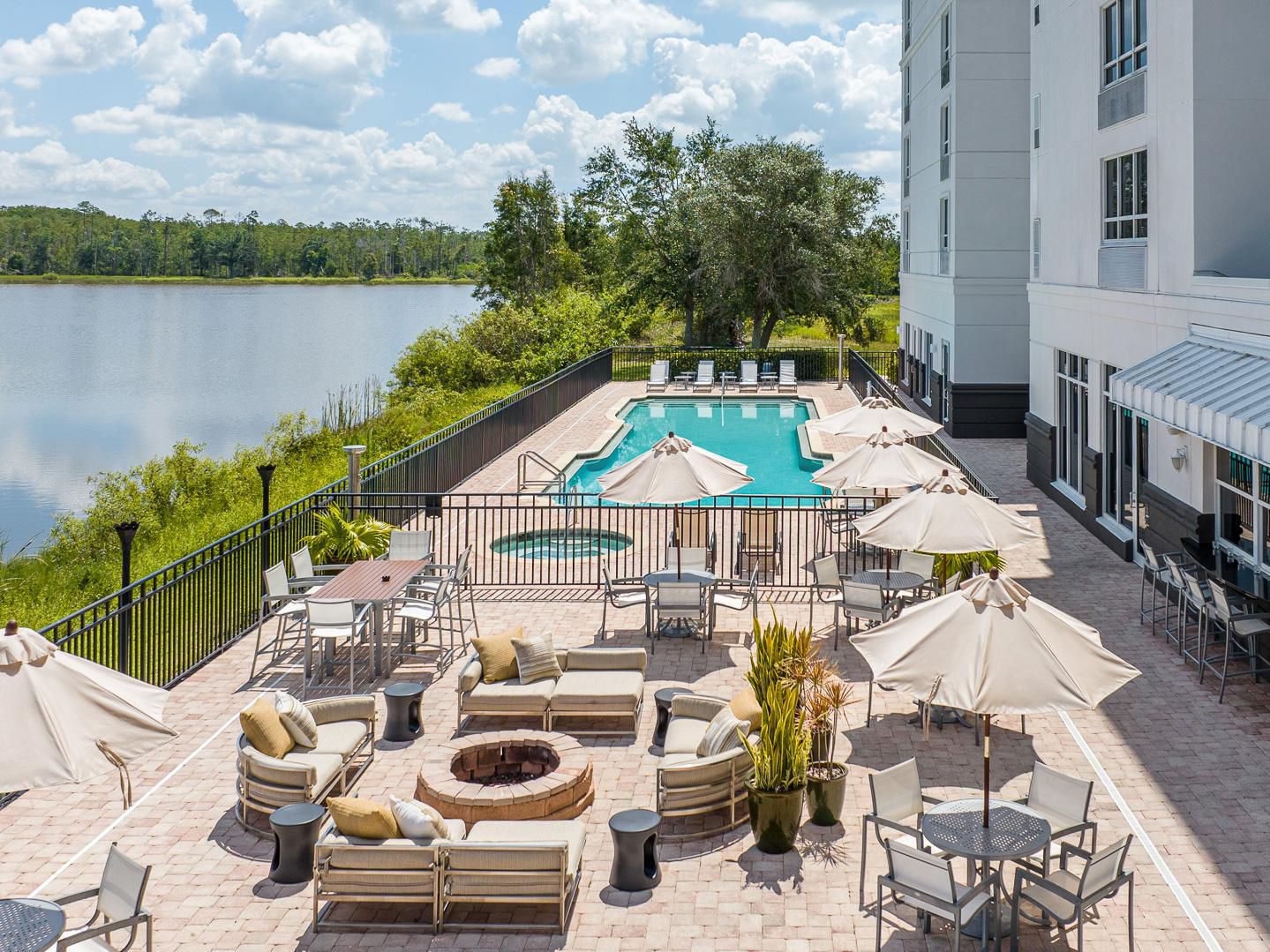 Our extensive lakefront outdoor entertainment area is the perfect place to unwind. Take a refreshing dip in the pool, relax in the Jacuzzi, or gather around the fire pit for a cozy evening. The scenic views and tranquil setting provide a delightful backdrop for relaxation and socializing, ensuring a memorable Fort Myers experience.