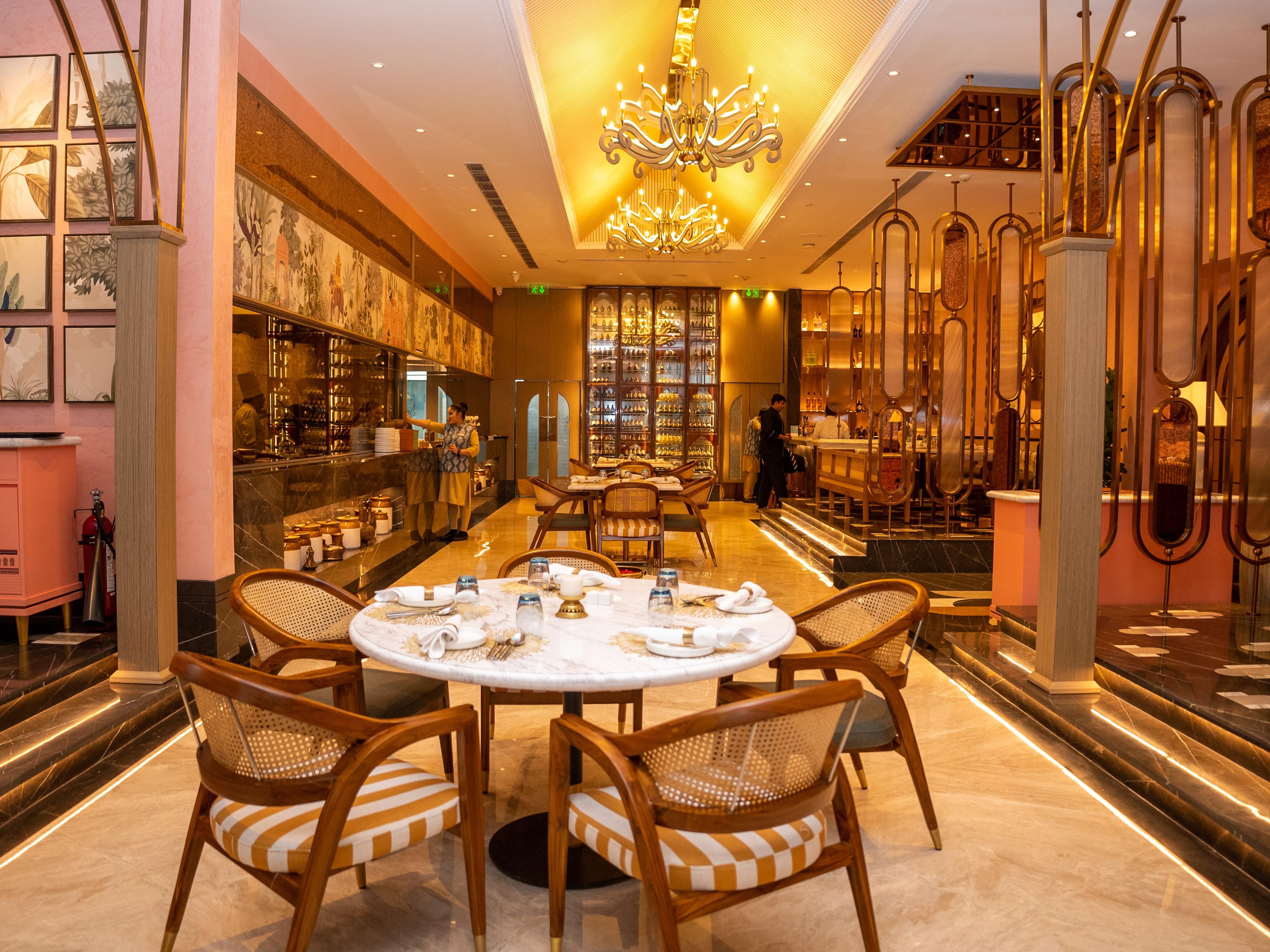 A contemporary dining destination offering a fusion of traditional Indian flavors with modern culinary techniques. Inspired by the iconic brass cookware of India, Kaansa blends heritage with innovation, delivering an elevated gastronomic experience.