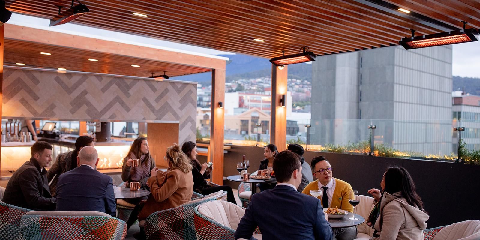 Cozy seating and skyline views at The Deck.