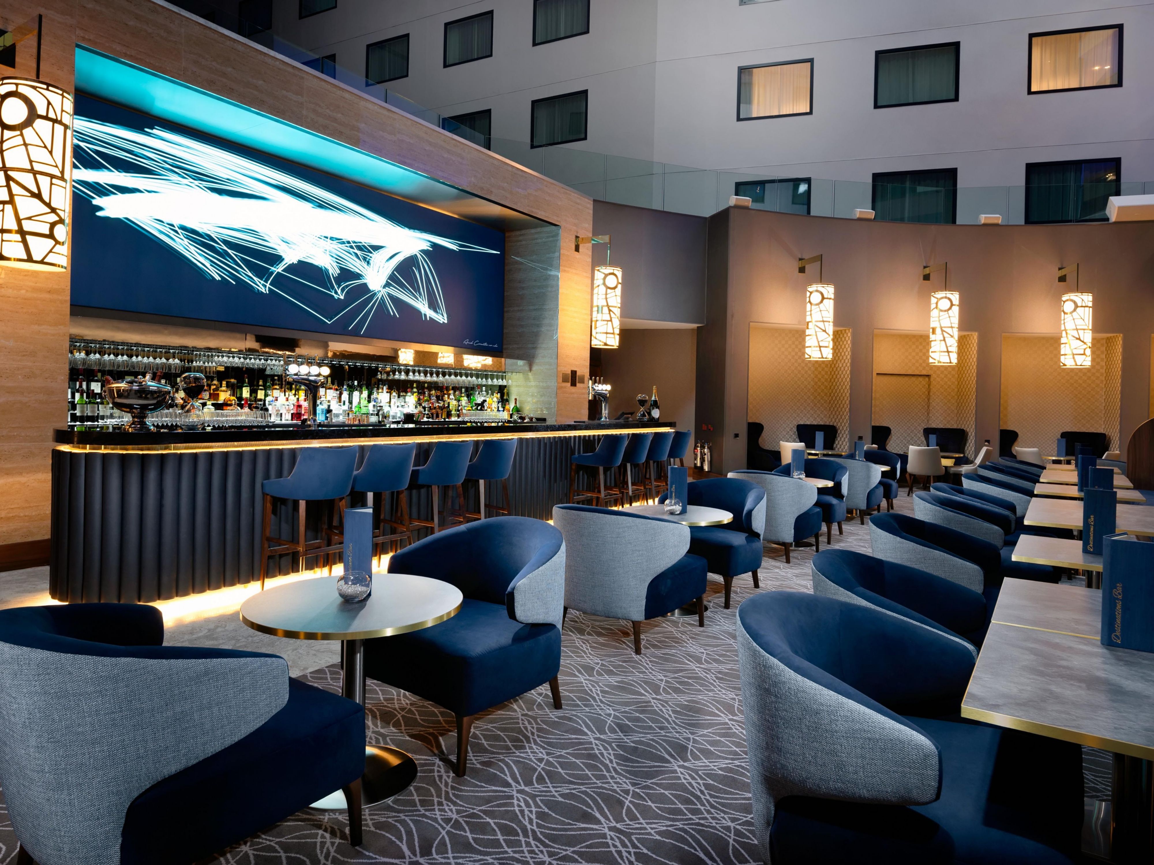 The Destinations Bar offers a variety of locally sourced beverages along with a street food themed menu featuring sharing platters. Whether you are in need of a quick bite or desire a relaxing atmosphere to enjoy our refreshing cocktails after a long flight, our bar provides the ideal setting for your needs.