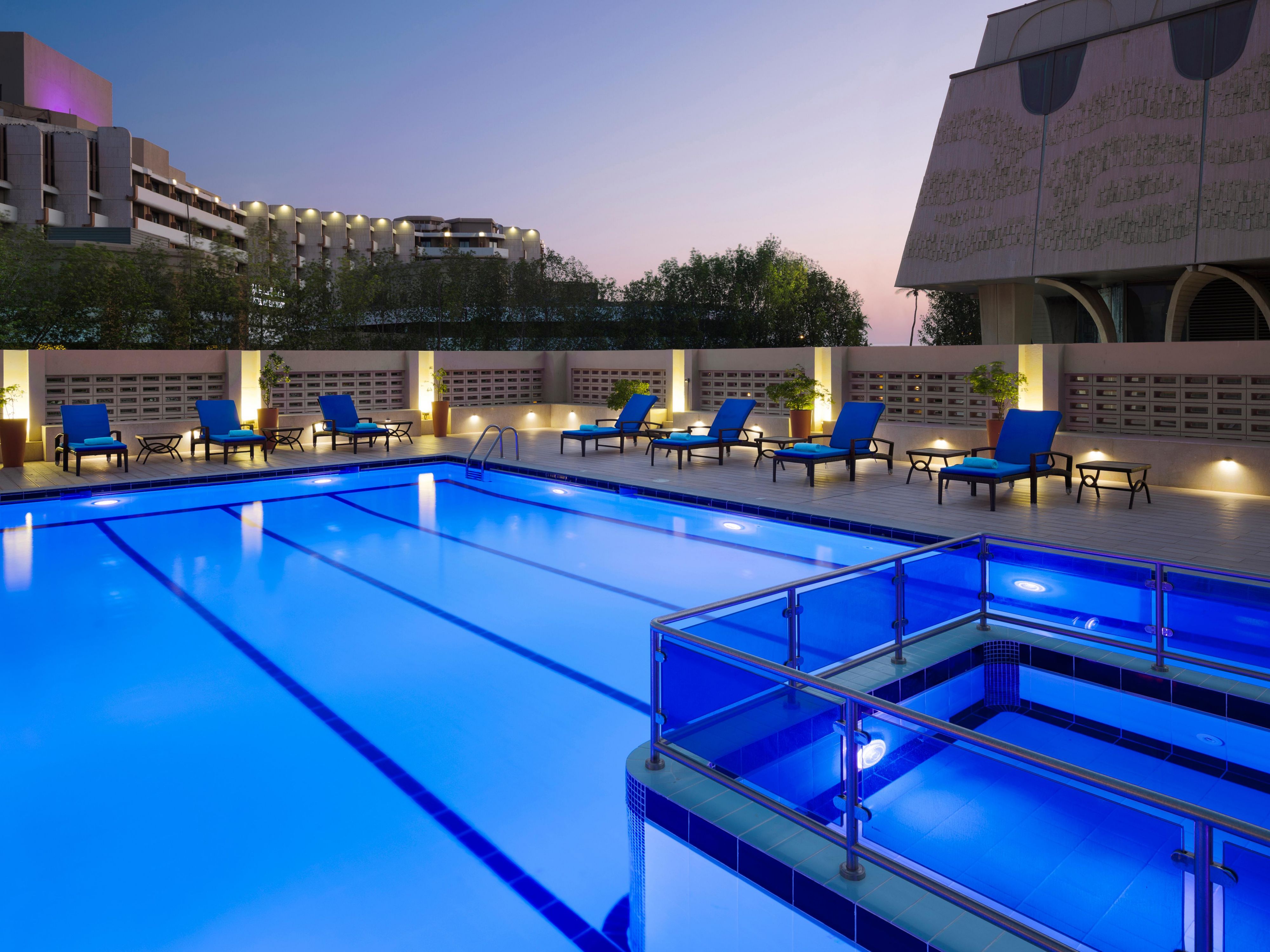 Relax in the serene embrace of our outdoor pool, set amidst lush greenery. The outdoor pool offers the perfect balance of comfort and relaxation. With pristine waters and a peaceful setting, it is an ideal escape from the city's pace, where every moment feels effortlessly rejuvenating.