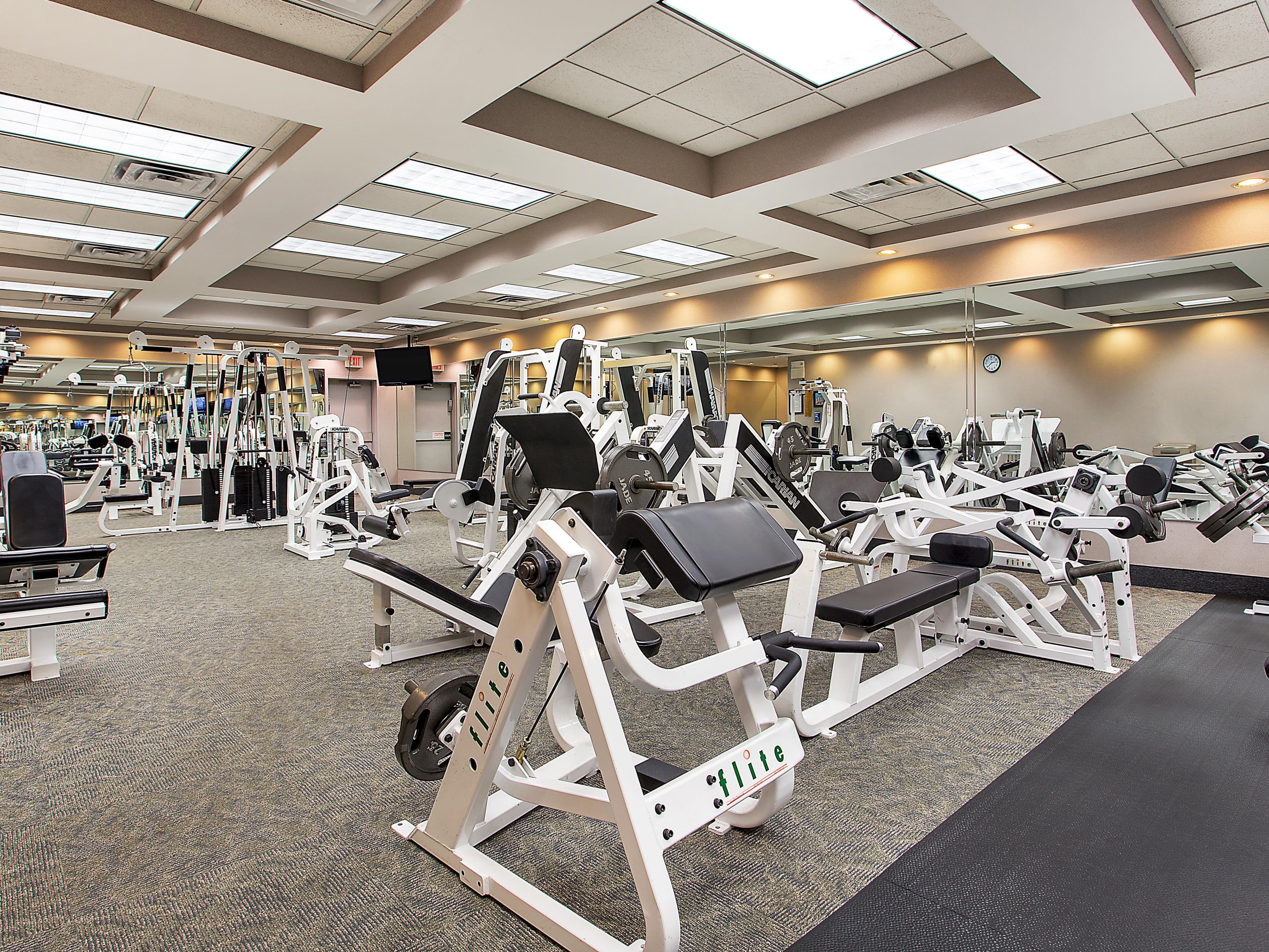 Maintain your workout routine at our expansive two-story gym designed to inspire and motivate. Open 24/7 and equipped with HD LCD televisions and a variety of equipment, including Peloton bikes, ellipticals, treadmills, stair climbers, rowing machines, and weight machines, we make it easy to stay committed to your wellness goals.