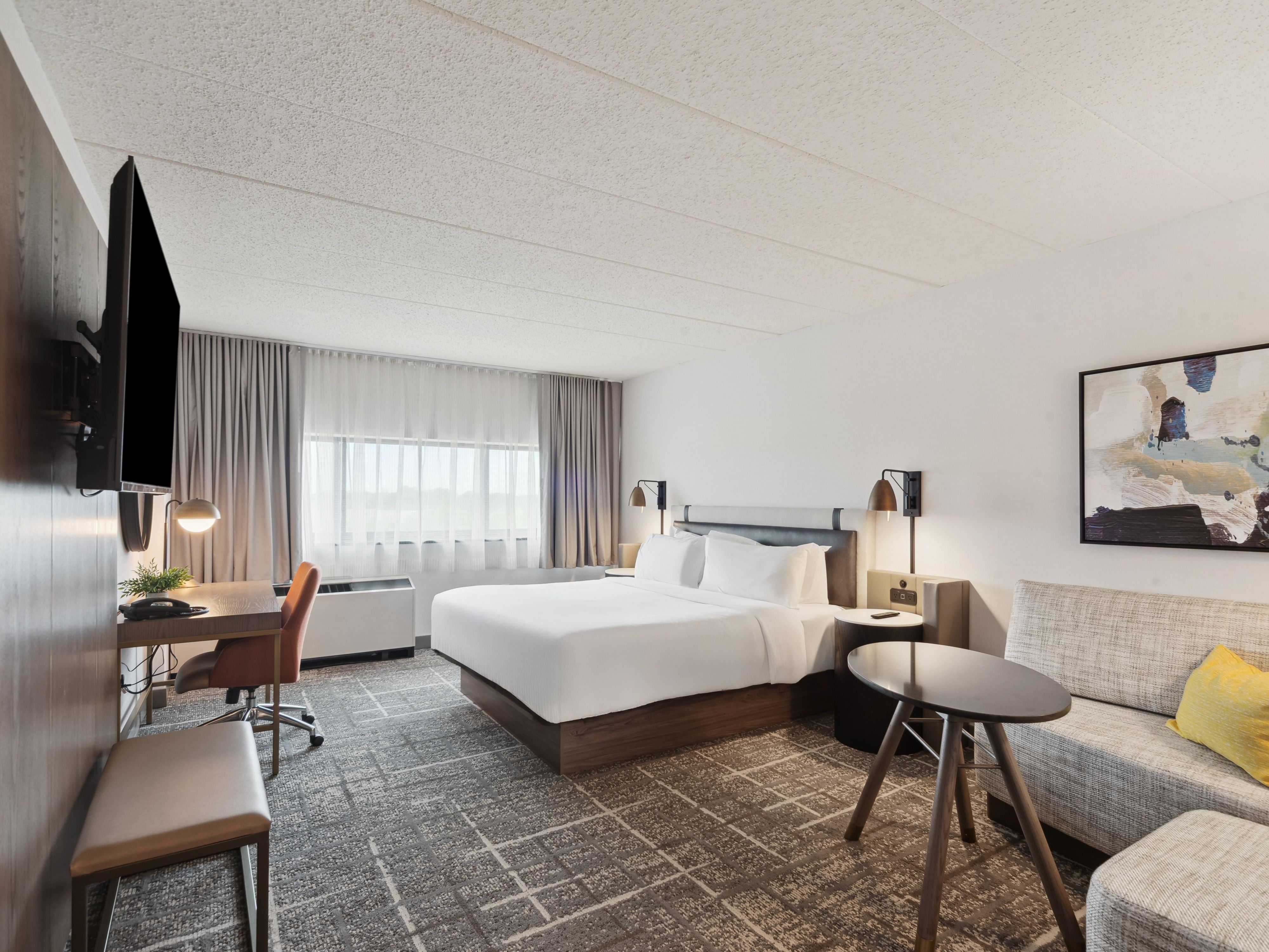 Relax in our clean, comfortable guest rooms designed with your comfort in mind. Whether you’re here for business or leisure, you’ll appreciate the thoughtful amenities and cozy atmosphere that make our rooms a restful retreat after a busy day exploring Lansing or attending meetings.