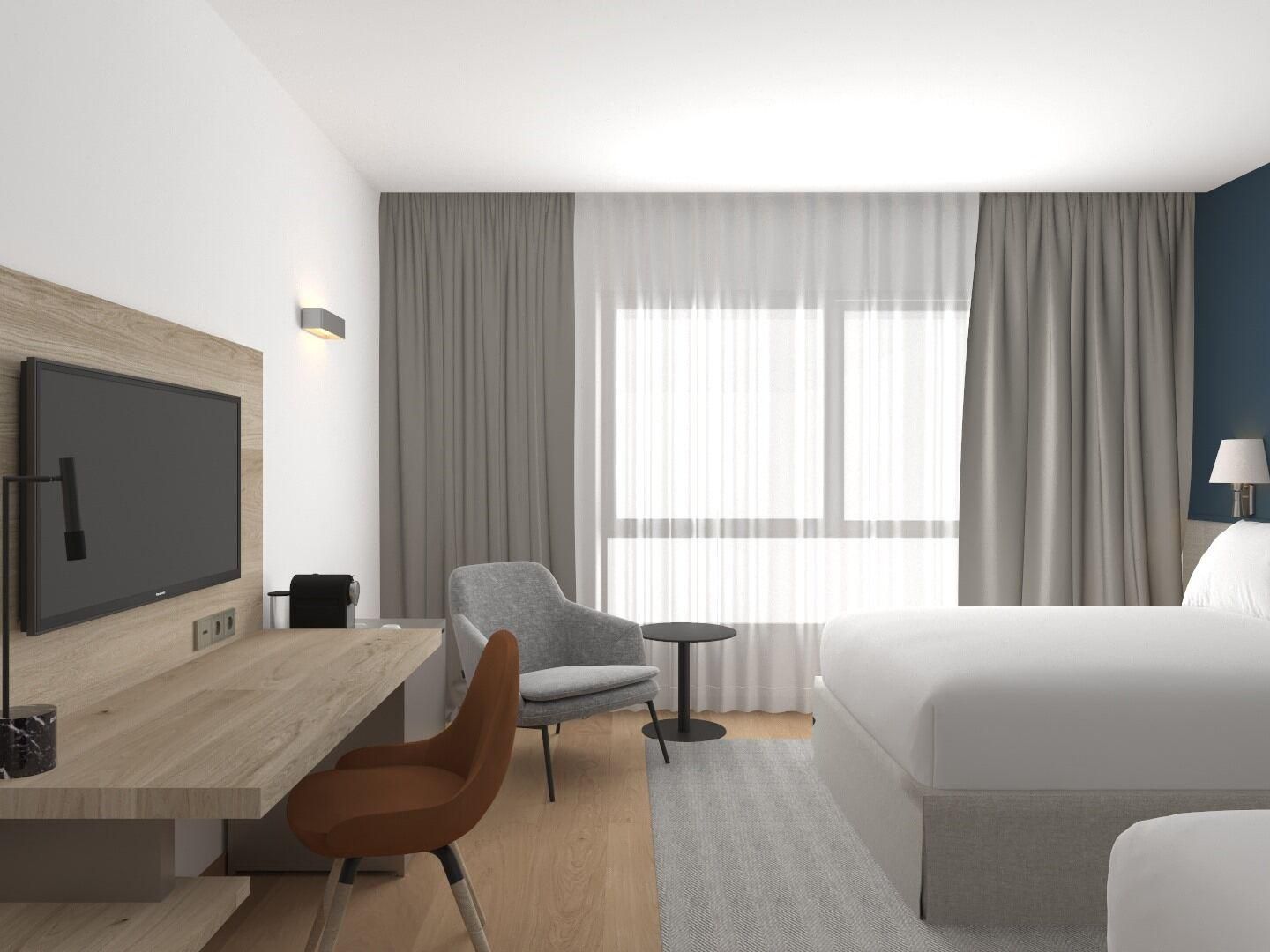 Here at Crowne Plaza Madrid Hotel we are ready to welcome our families by providing "Family rooms" that are composed by 2 double beds (1.35cm/each) accommodating 2 adults and 2 children comfortably.