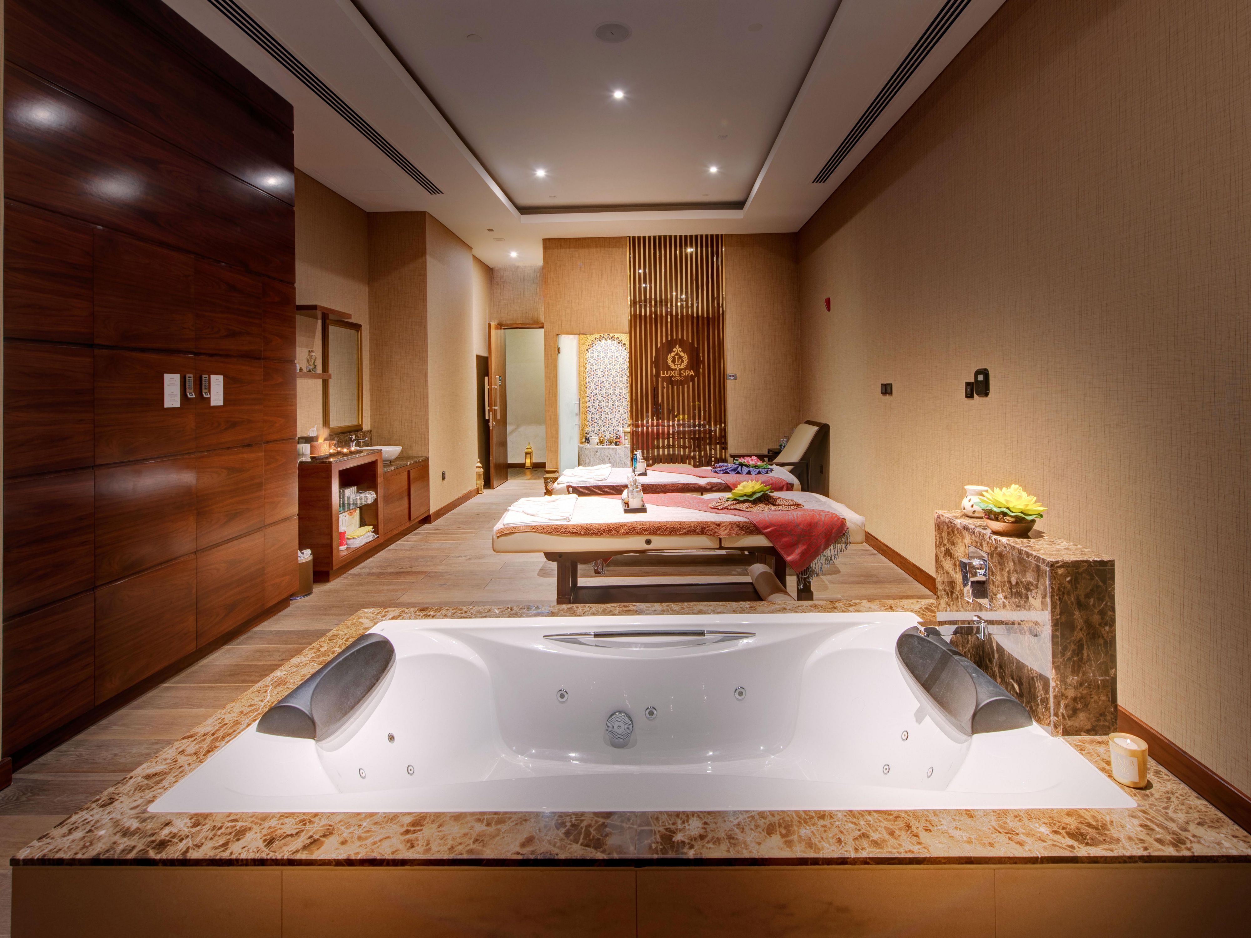 Indulge in a world of relaxation at Luxe Spa, where serenity meets luxury. Rejuvenate your senses with our expertly crafted treatments, from soothing massages to invigorating wellness rituals. Let our skilled therapists take you on a journey of ultimate relaxation, restoring balance to your body and mind.