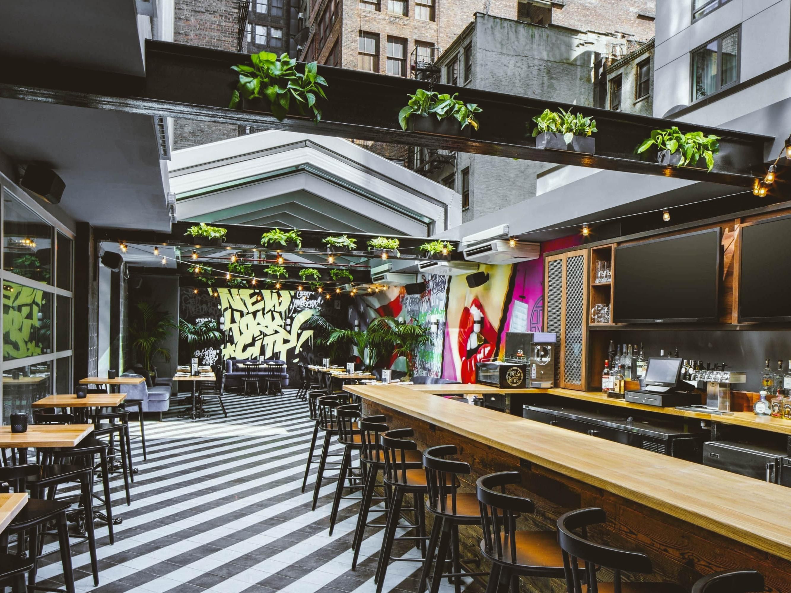 Book your private cocktail parties, wedding showers, and corporate events in our outdoor space featuring a private bar and panoramic roof. The venue can host up to 70 people and is catered by Burgerology. 