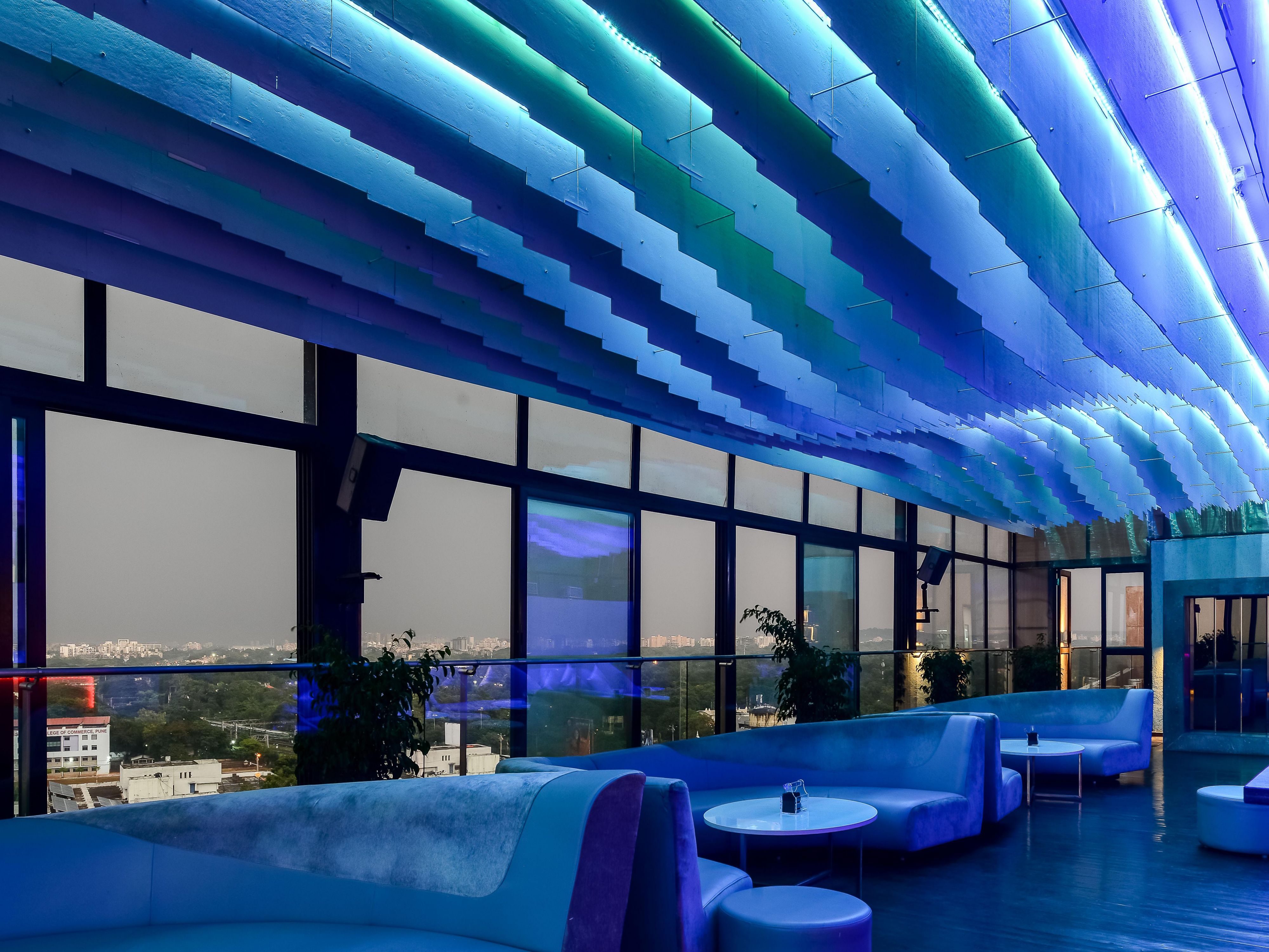 Experience Pune's nightlife at Evviva - The Sky Lounge. Enjoy a panoramic view of the city with sizzling bites and refreshing signature sips!