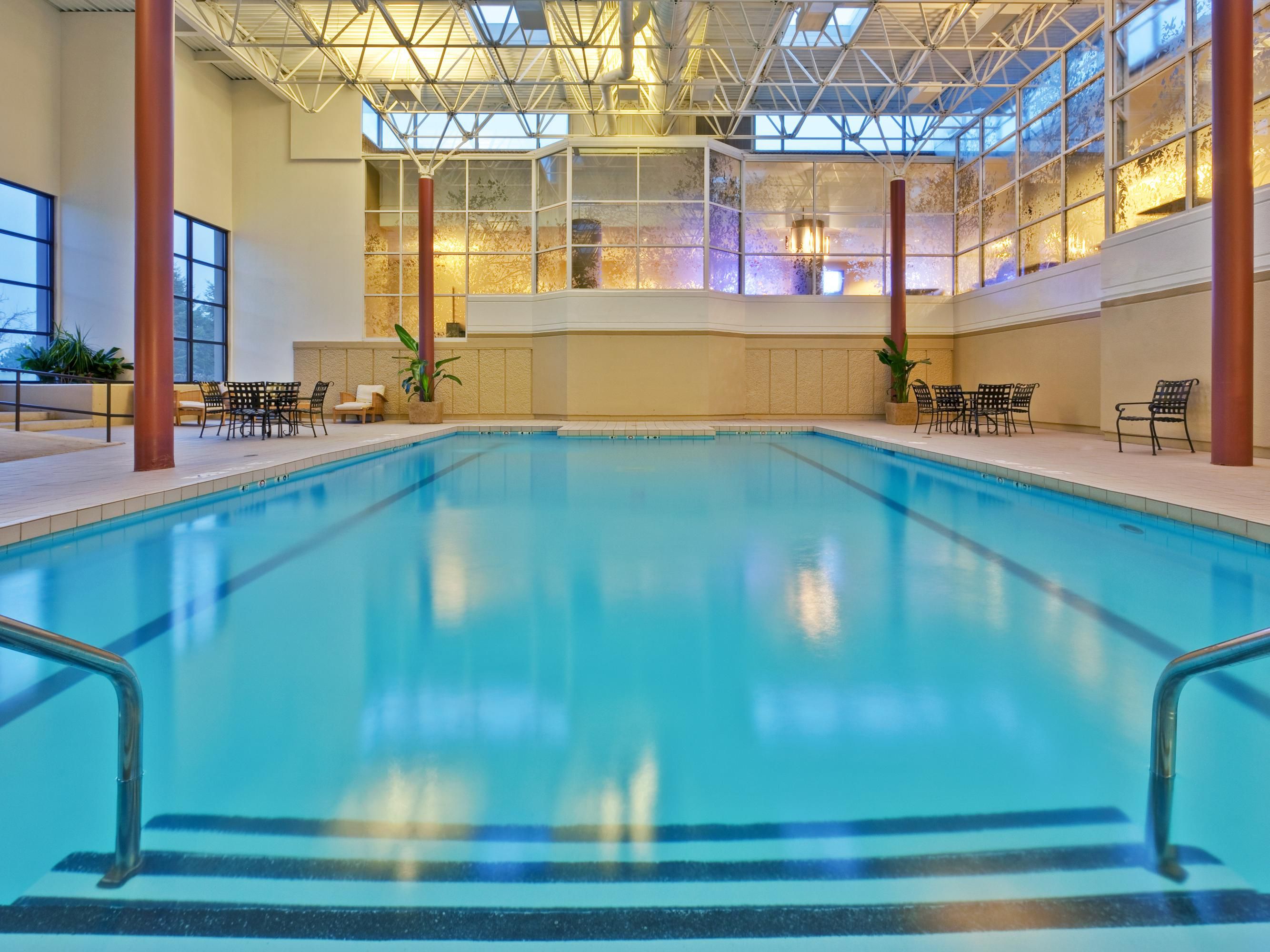 Nestled in our all-season atrium, our indoor heated pool invites you to immerse yourself in the soothing waters and let your stress melt away. Whether you swim a few laps, float on your back, or splash around with your kids, our pool provides the perfect place for recreation and relaxation.