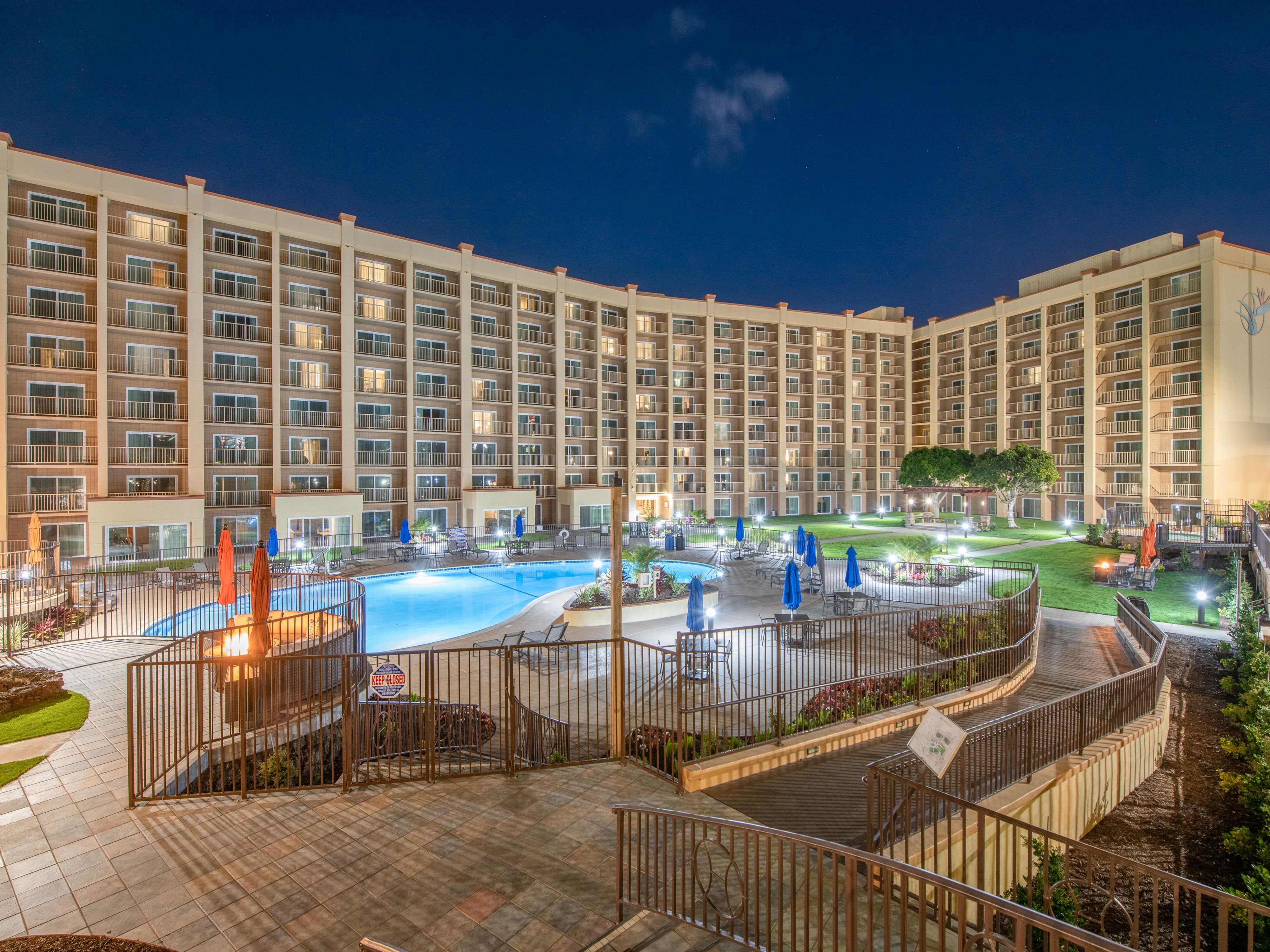 Relax by the pool under a blanket of stars.