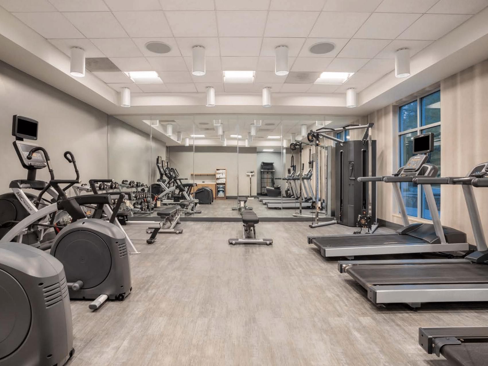 Keep up with your fitness routine in our 24-hour Fitness Center, featuring premium equipment such as ellipticals, treadmills, stationary bikes, and free weights. Whether it’s a morning workout or a late-night session, you’ll have everything you need for a great workout.