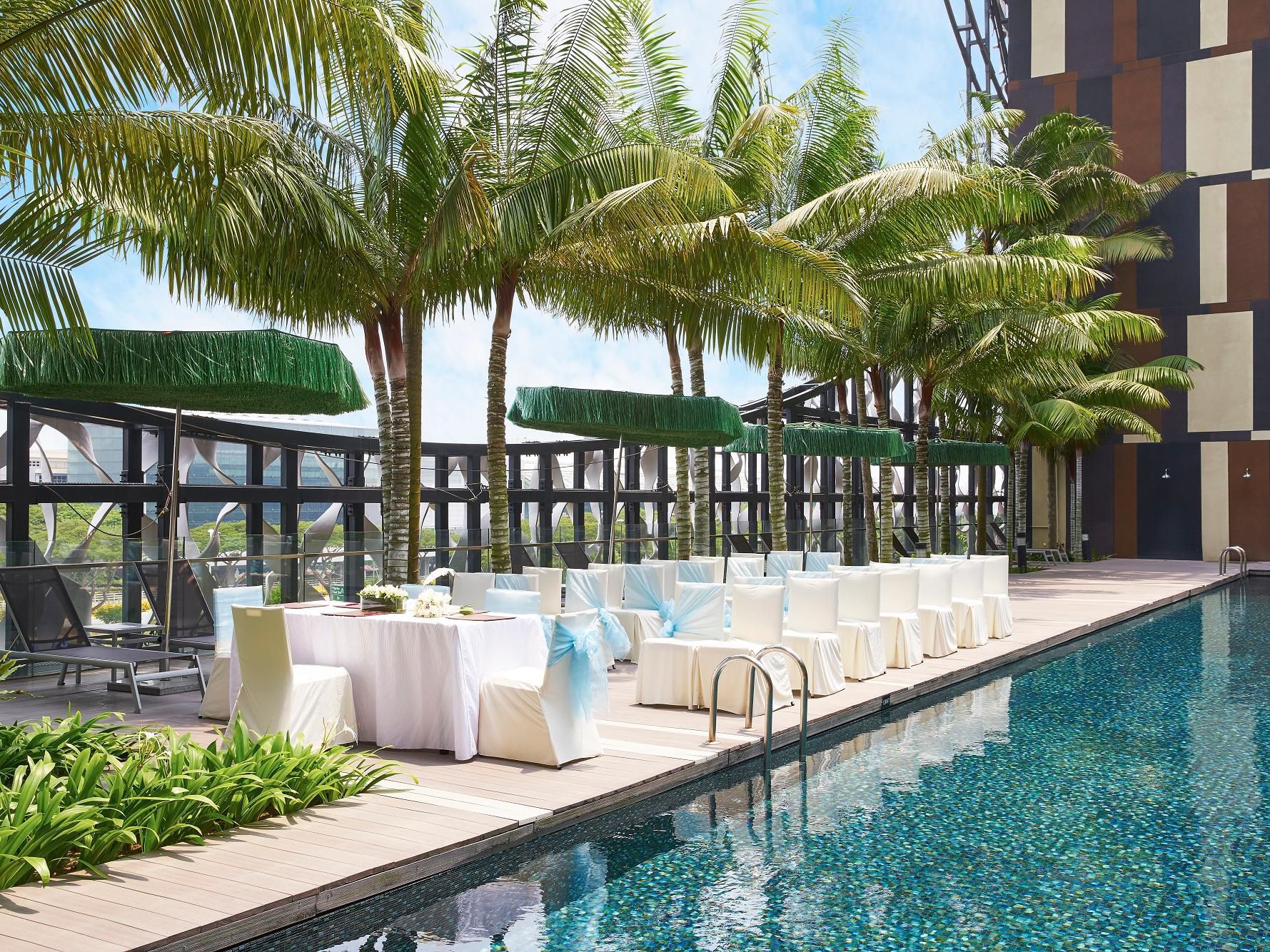 Our modern venues make for picture-perfect backdrops for your special day, whether an intimate gathering by a sparkling tropical pool or a grand ballroom affair. Let our experienced Wedding Planner help you plan the wedding of your dreams and create unforgettable memories that will last a lifetime.