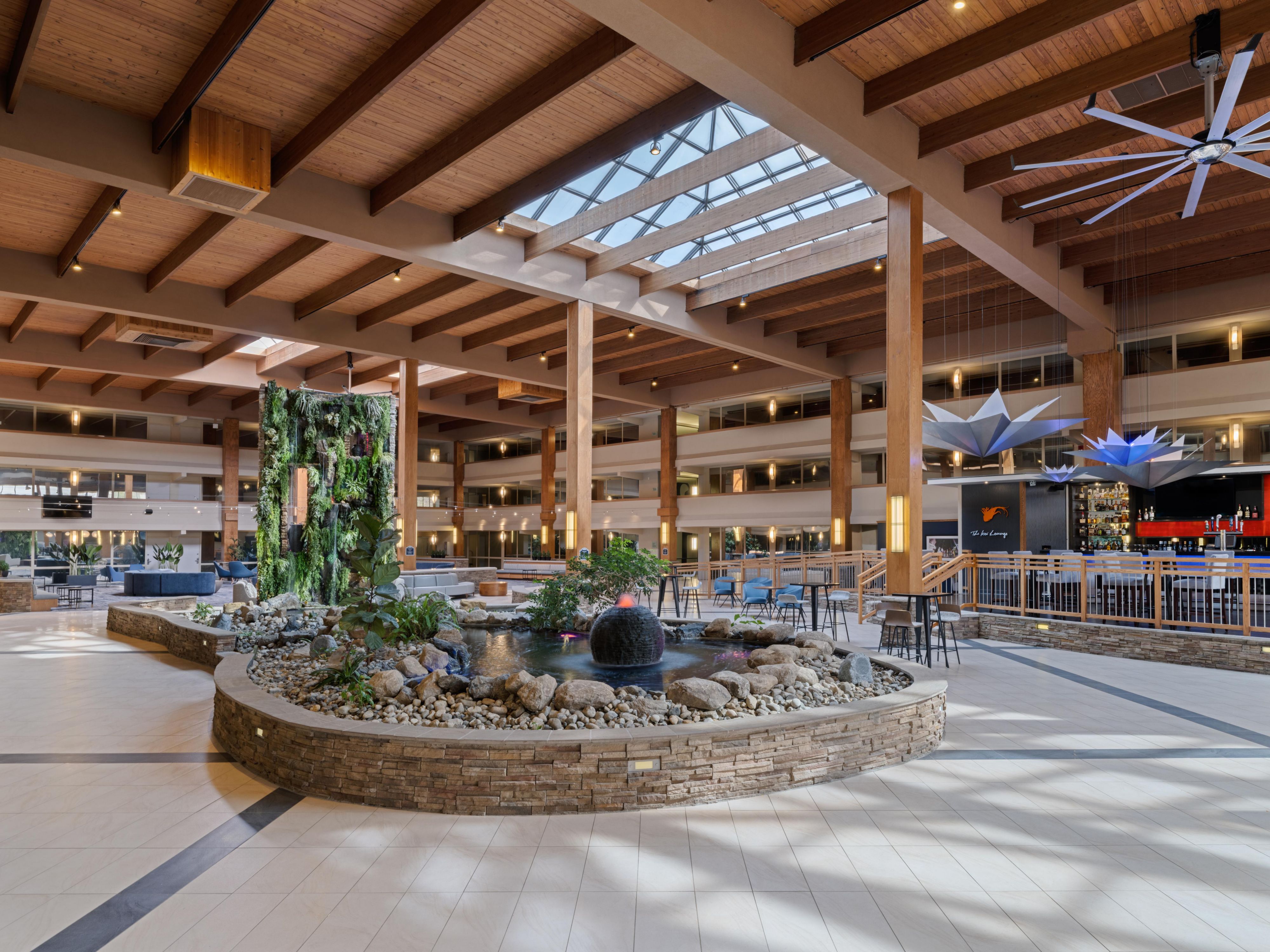 Enjoy the lush atrium and koi pond by the Koi Lounge in our Suffern, NY, hotel. Watch our koi friends swim in the calm pond, enjoy the green leaves, and sip, chat, and dine in a peaceful and relaxing environment. Whether you want to mingle with other guests or bring a book to read, the atrium is a beautiful place to spend your time. 