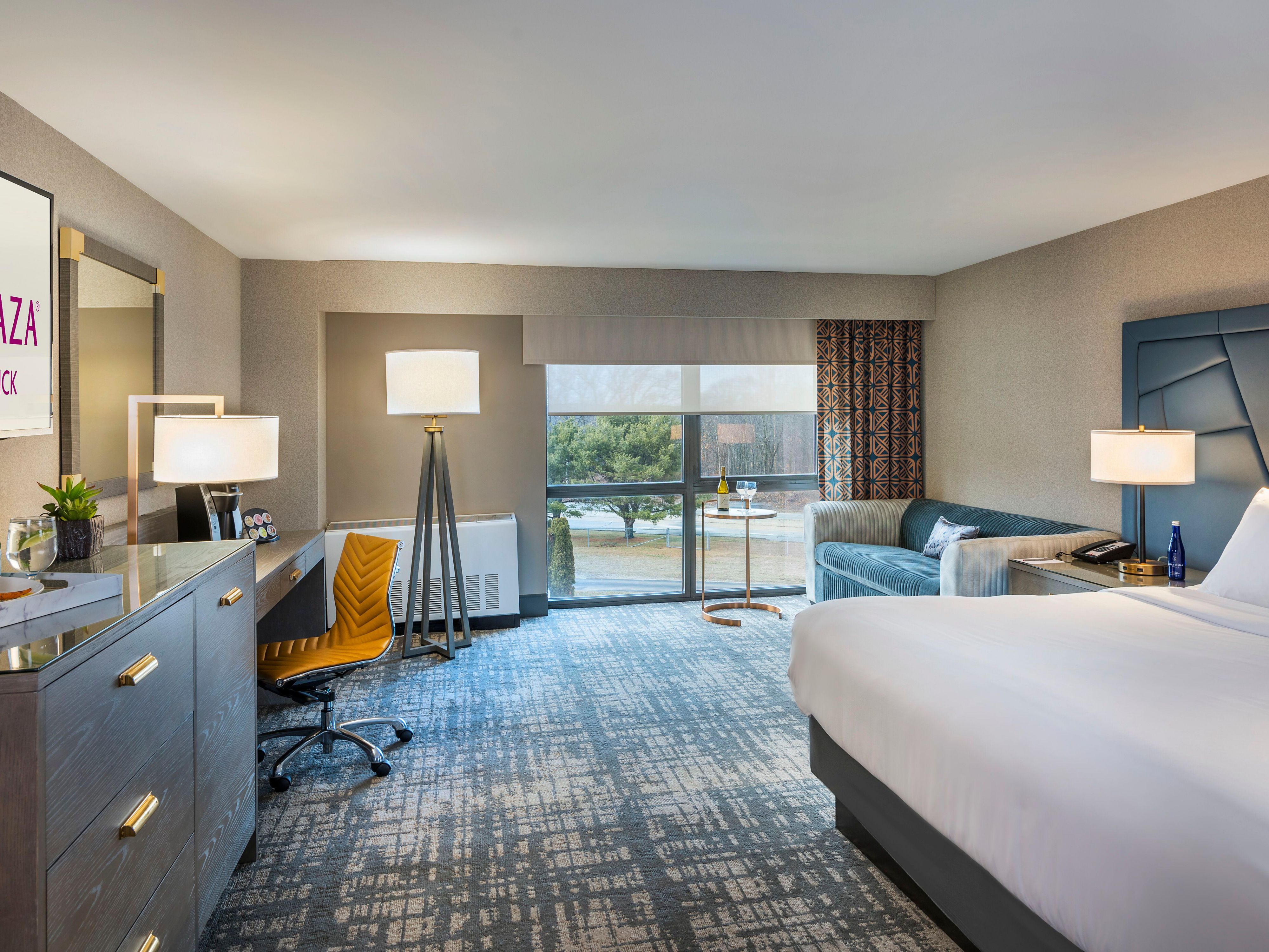 Check-in to our spacious king guest room and its amenities.