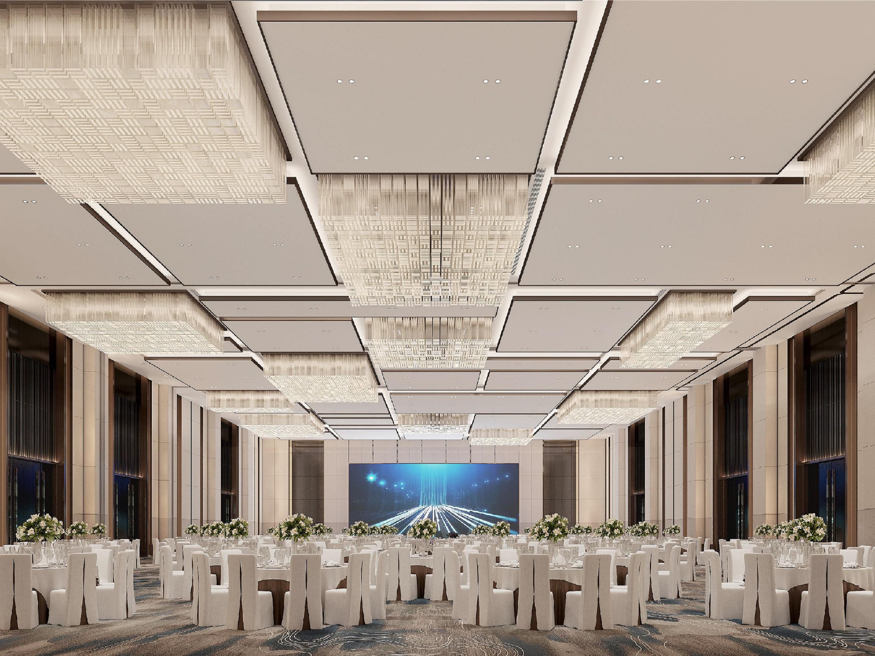 在我们层高挑高、配备双屏的华丽无柱式大宴会厅中庆祝您的重要日子，并提供量身定制的策划服务，打造令人难忘的婚礼与宴会体验。