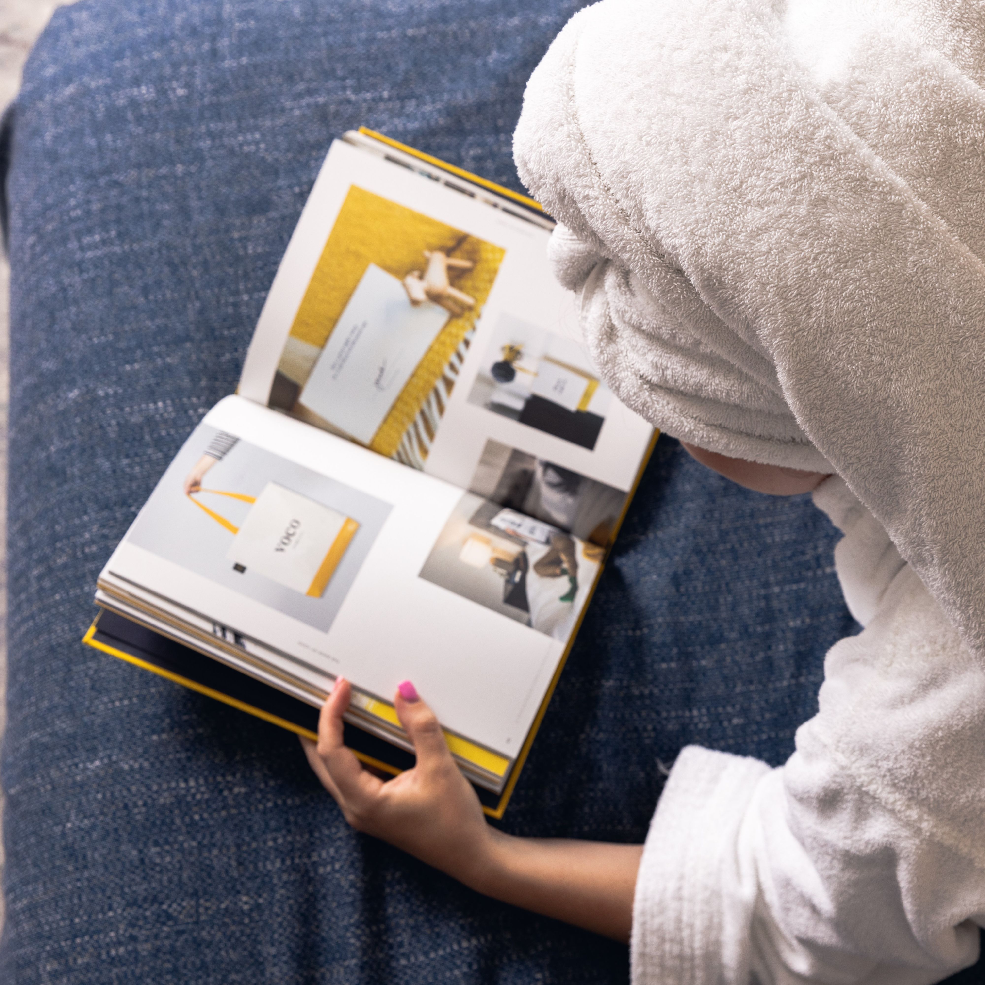 Guest reading in bed