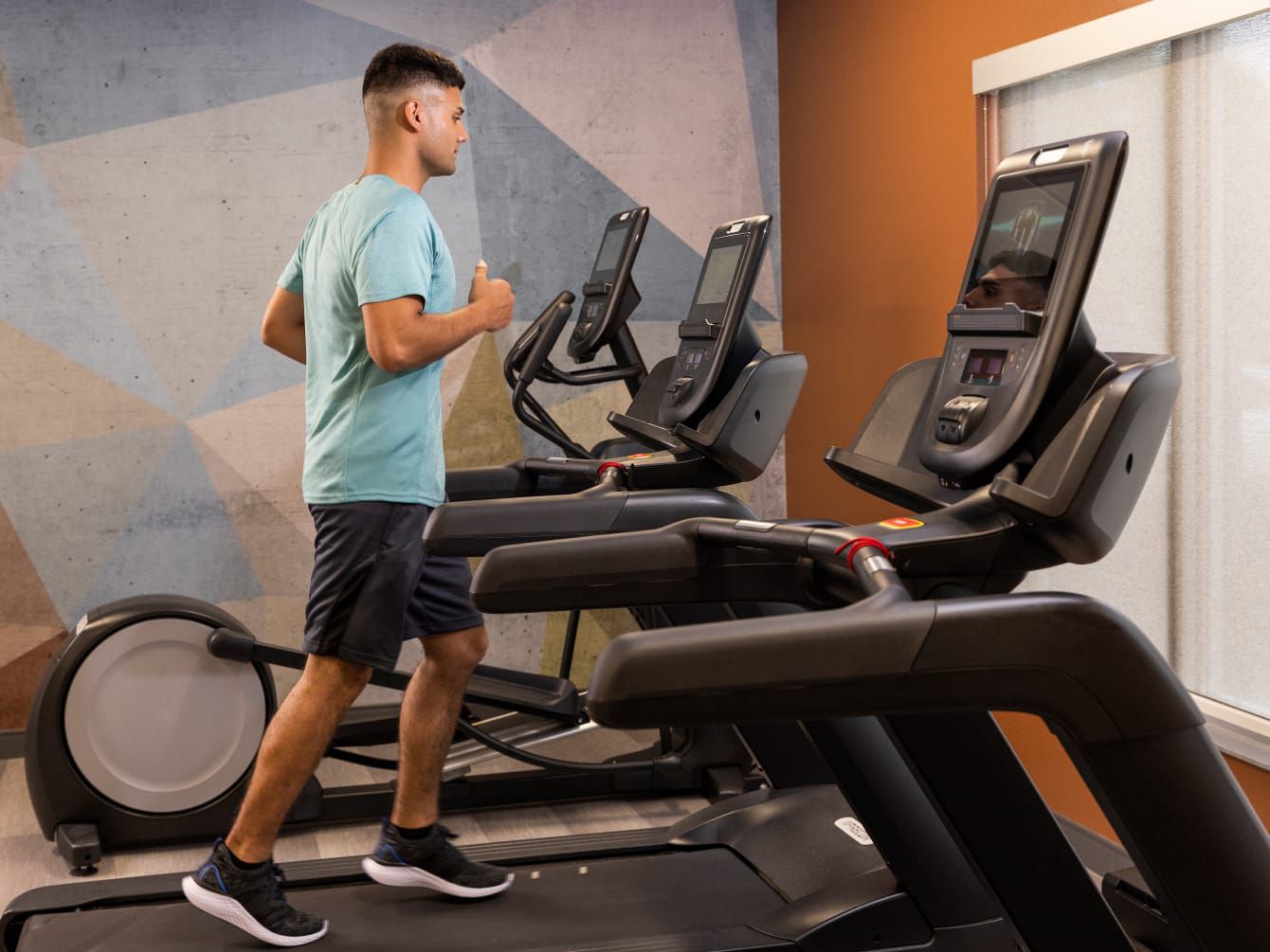 Man running on treadmill