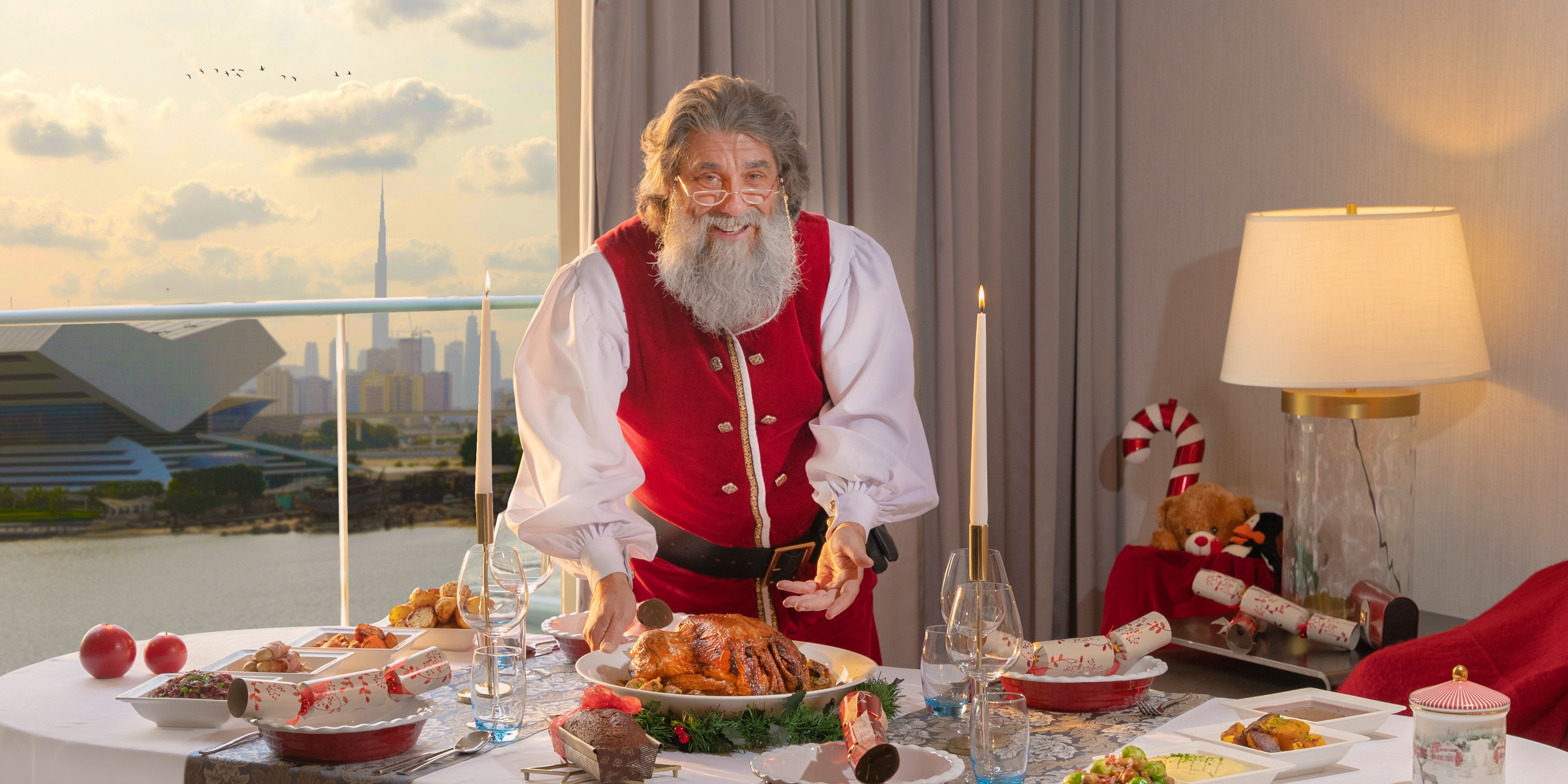 Santa presenting a Christmas dinner.