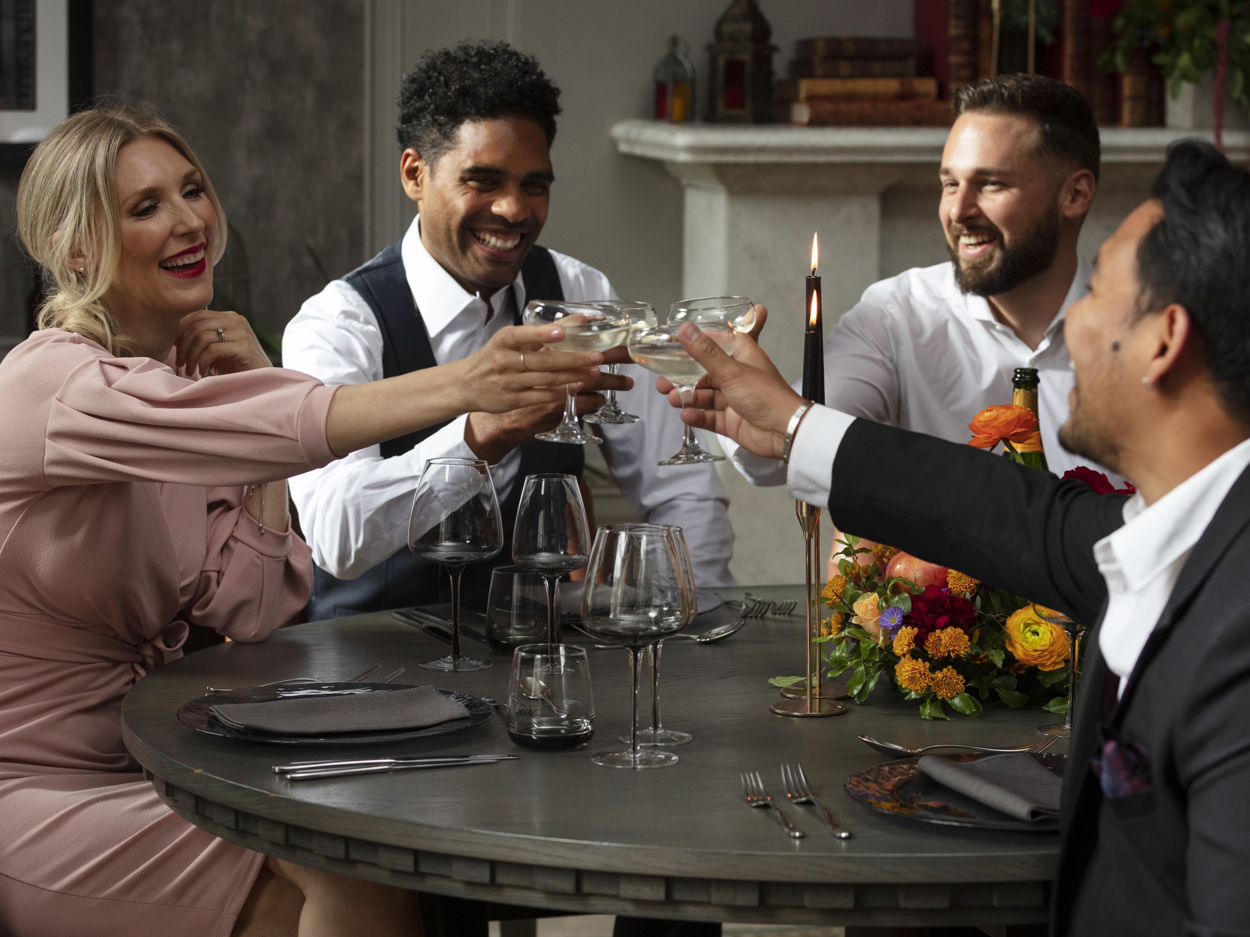 Friends dressed up and enjoying drinks