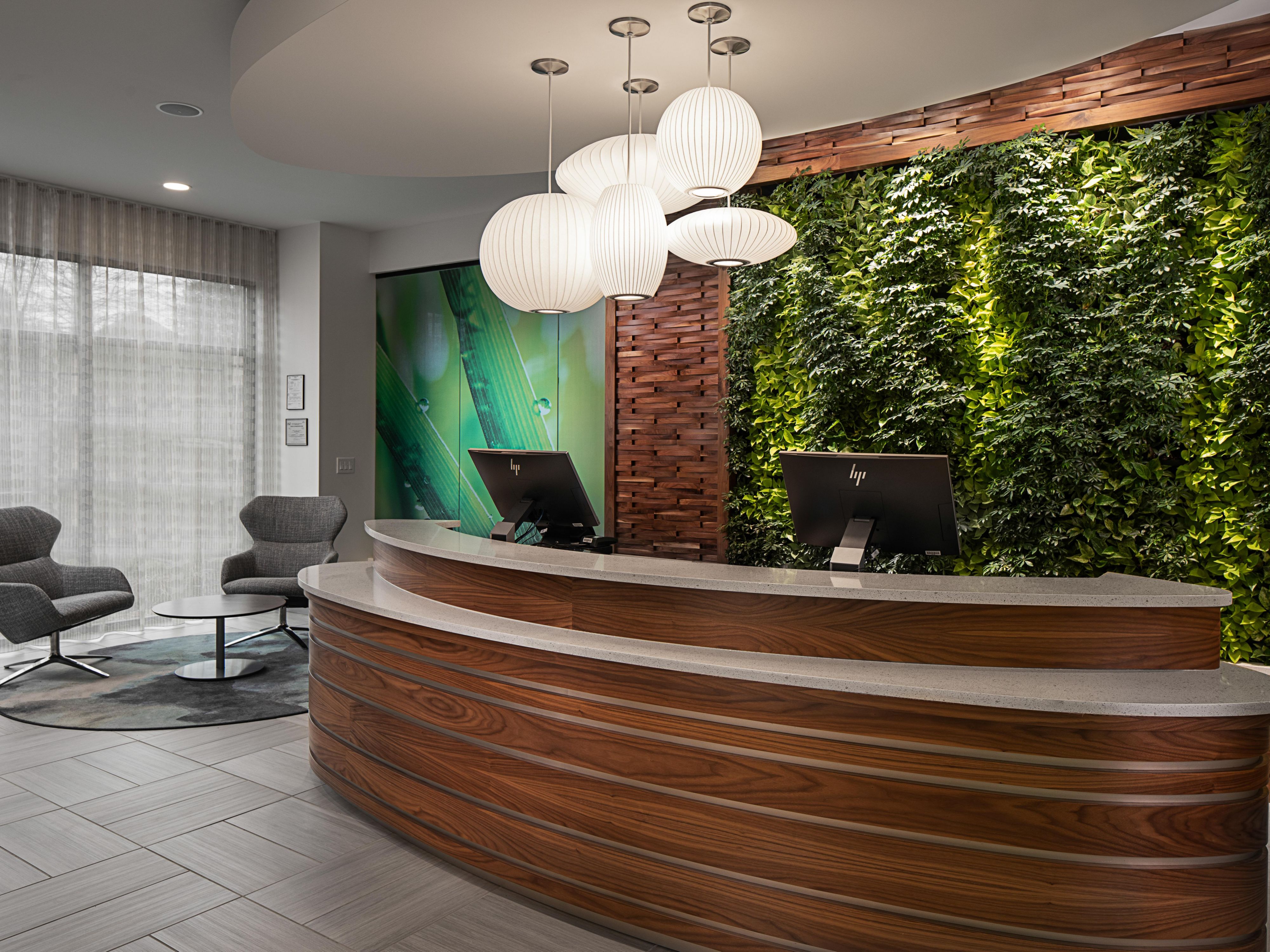 Guests love our living wall, a special touch at check-in.