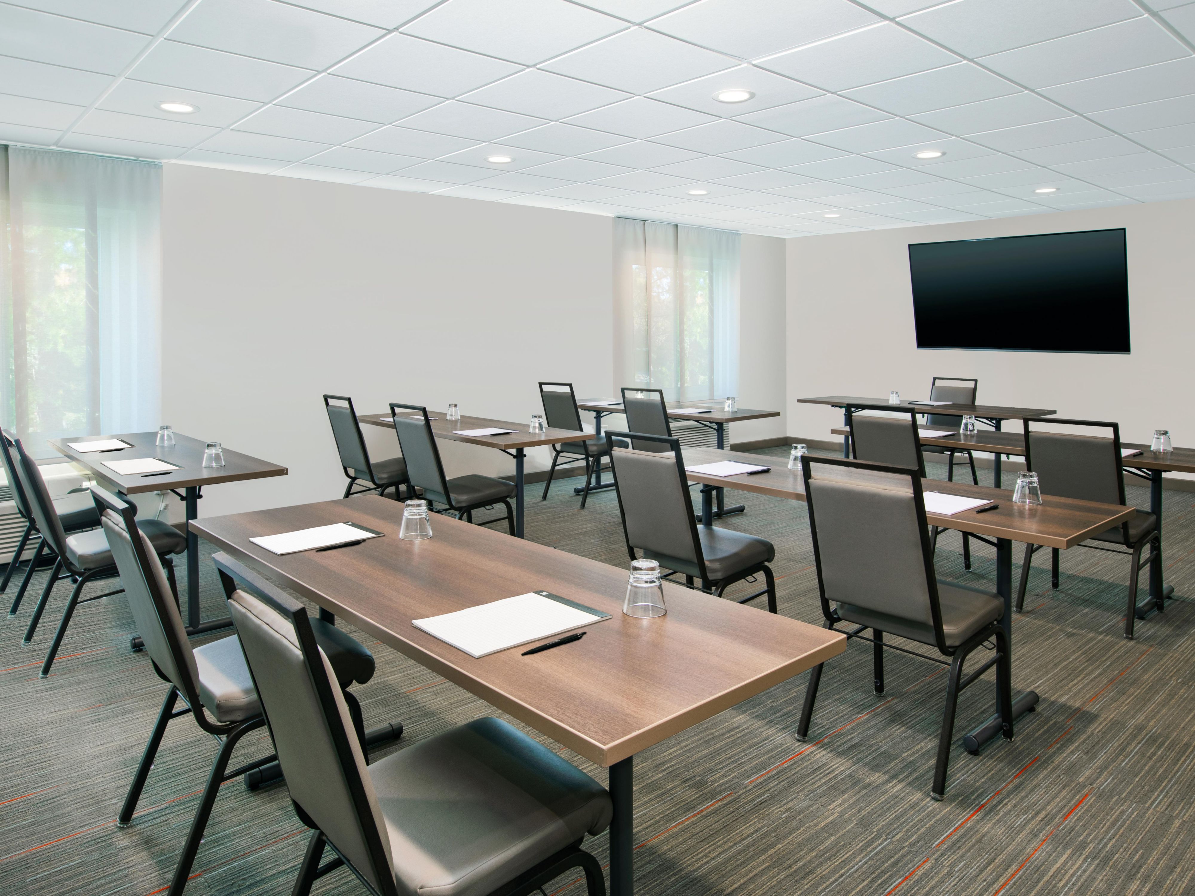 Host training seminars, conferences, and social gatherings in our three flexible meeting spaces, totaling 1,945 sq ft for up to 120 guests. Enjoy natural lighting and customized catering, plus AV equipment and personalized services. Earn IHG Business Rewards points for event space rentals and group room blocks. We make your meetings unforgettable!