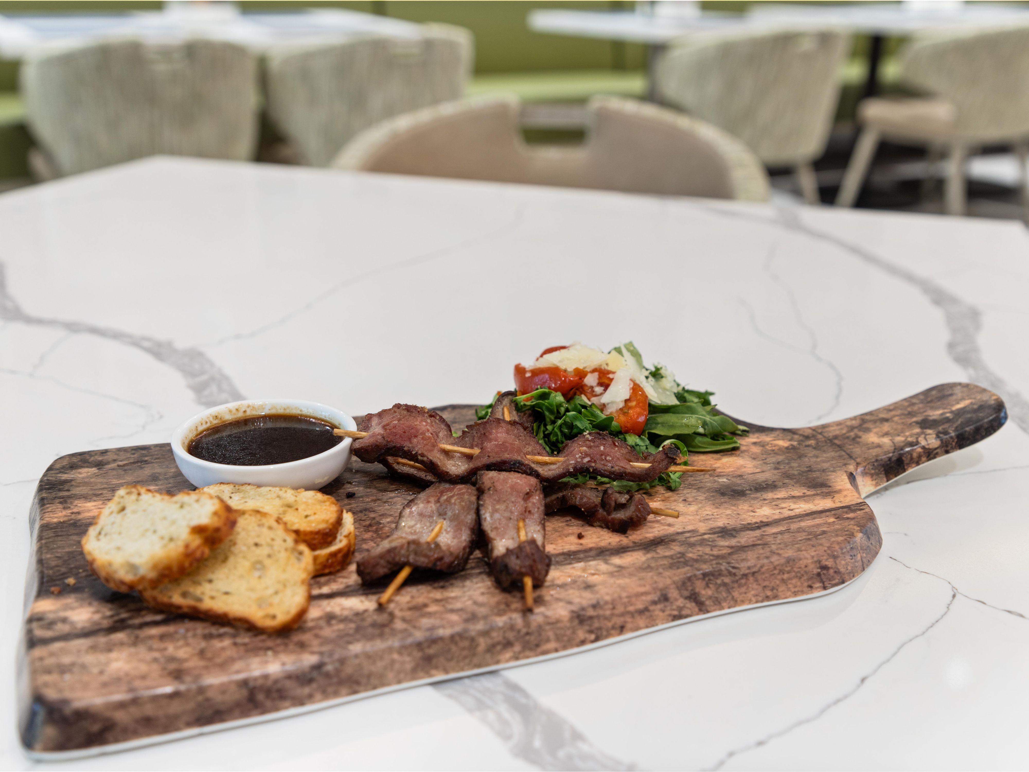 Sip on a cocktail while basking in the Austin sun. Elevate your stay with a $40 daily credit for food and beverage at EVEN Kitchen & Bar. Book our Stay and Dine package and enjoy our crave-worthy menu. 