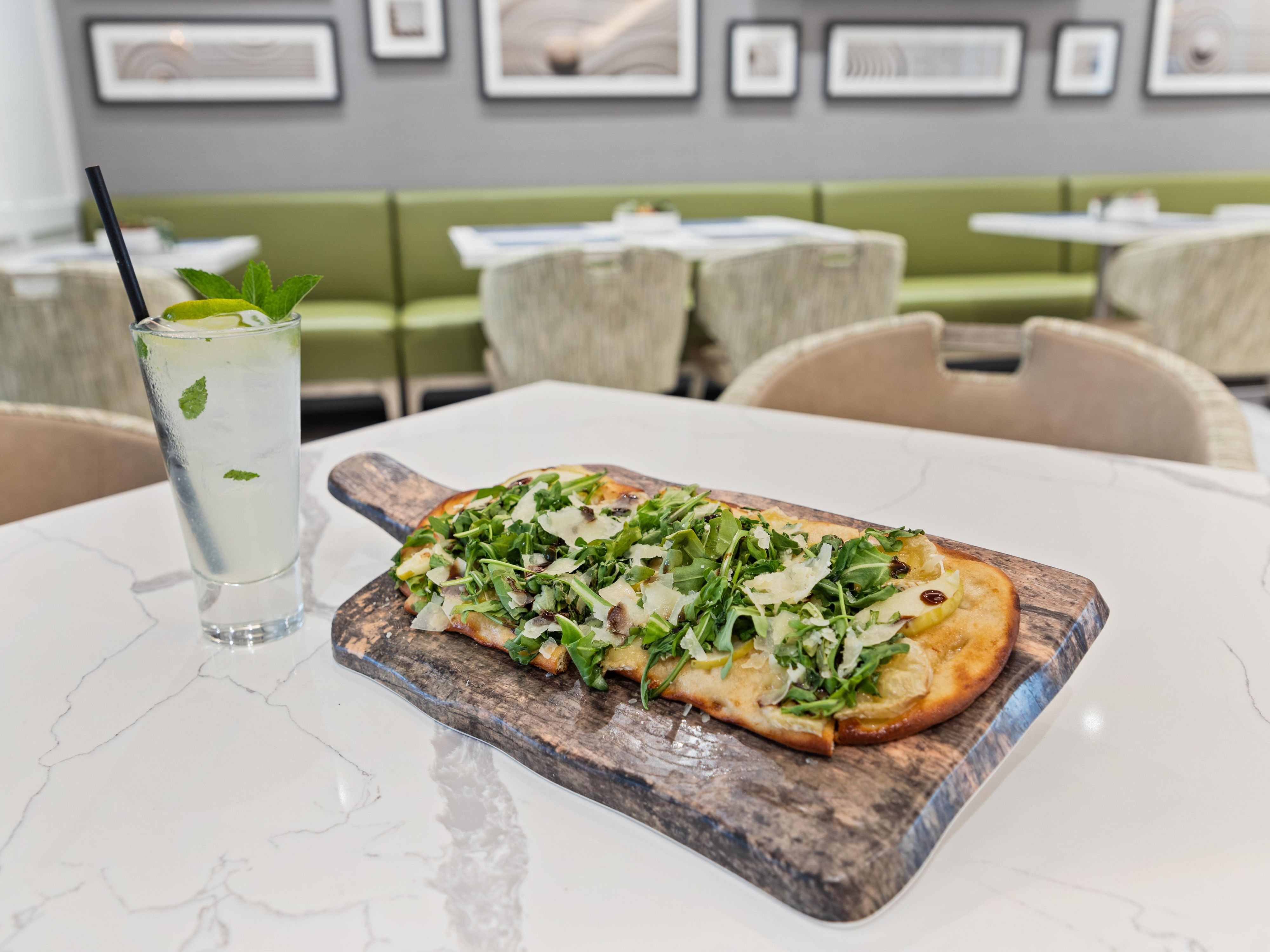 Sip on a cocktail while basking in the Austin sun. Elevate your stay with a $40 daily credit for food and beverage at EVEN Kitchen & Bar. Book our Stay and Dine package and enjoy our crave-worthy menu. 