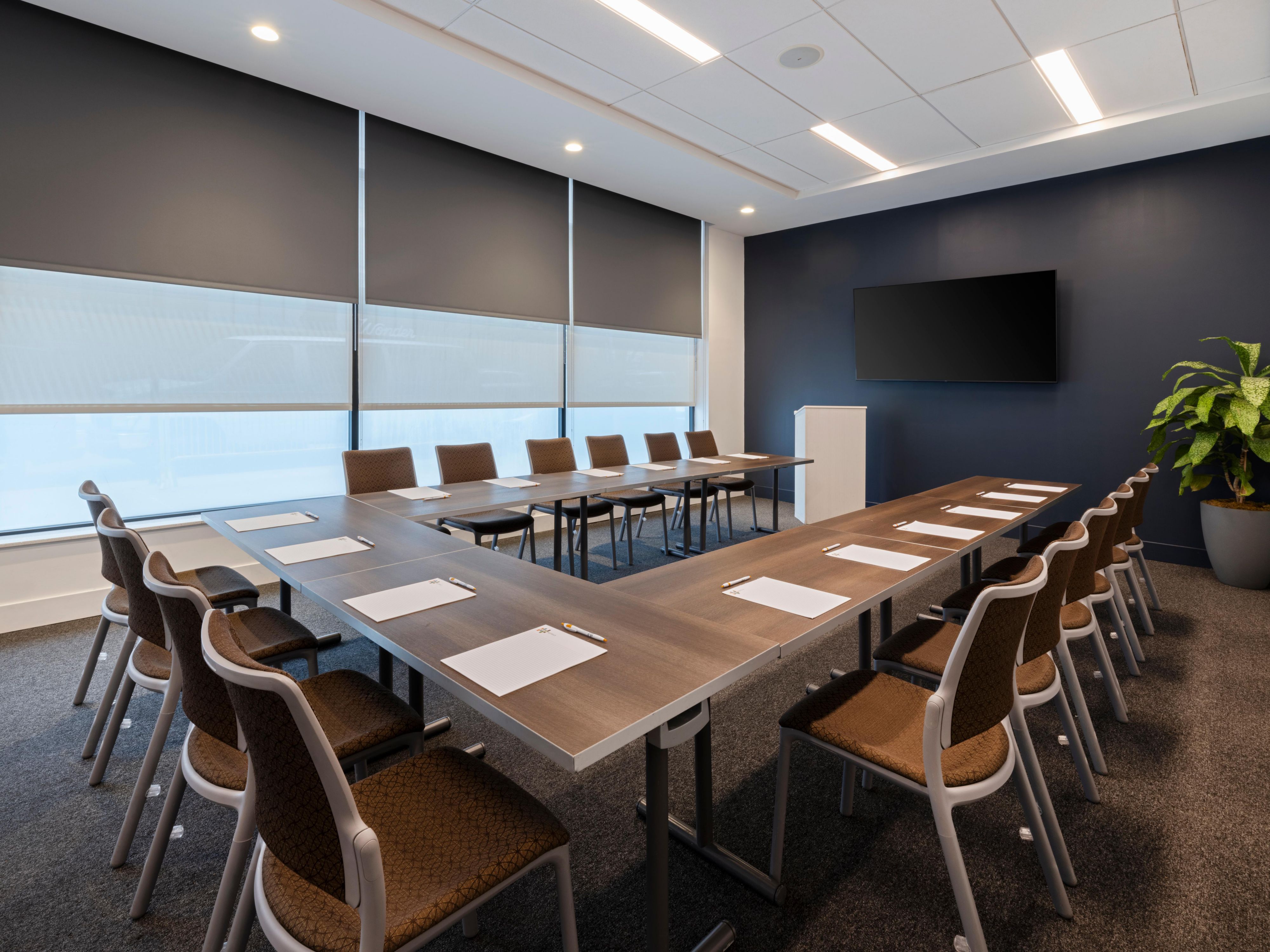 Event space with conference table and A/V equipment.
