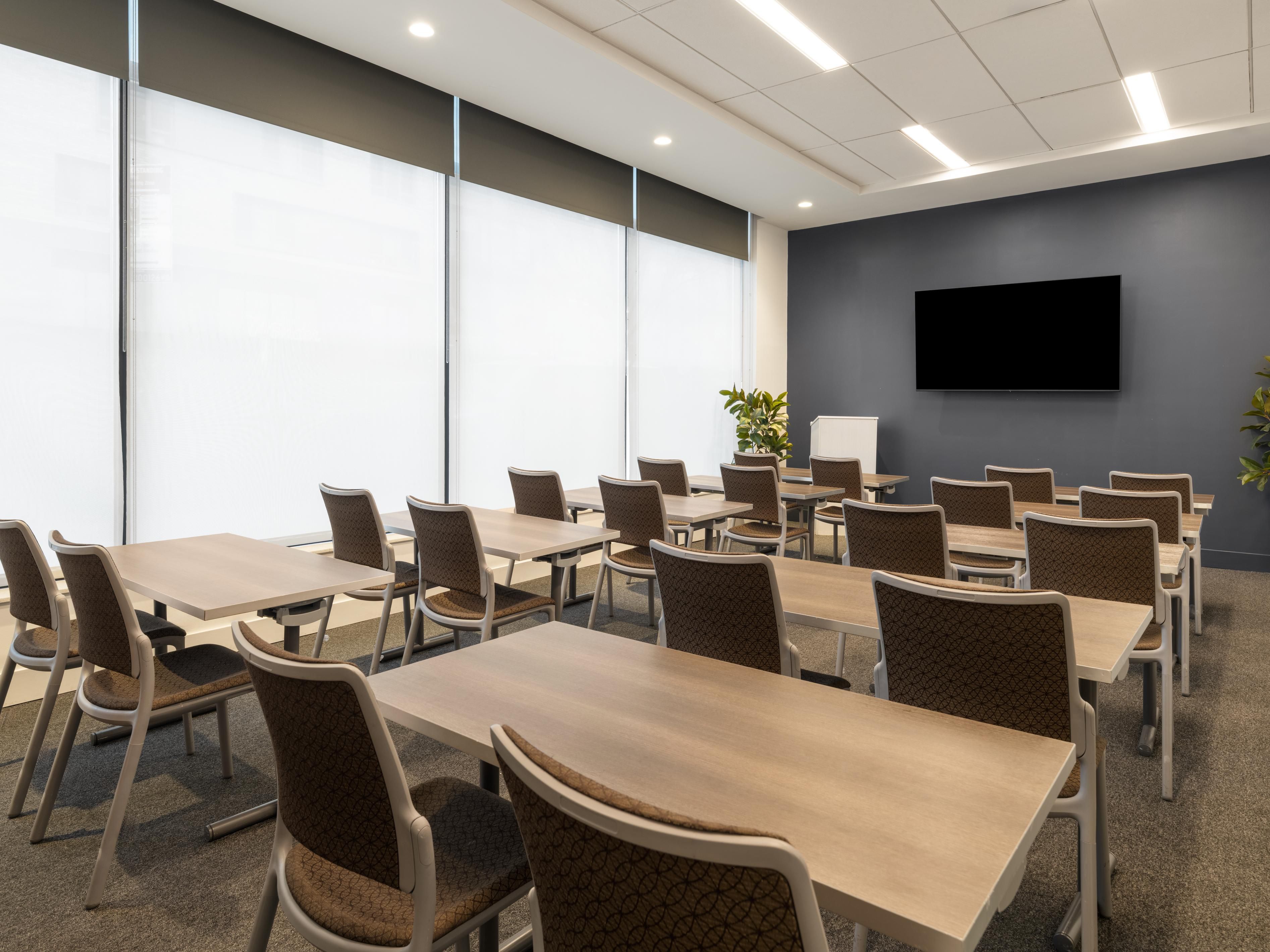Event space with conference table and A/V equipment.